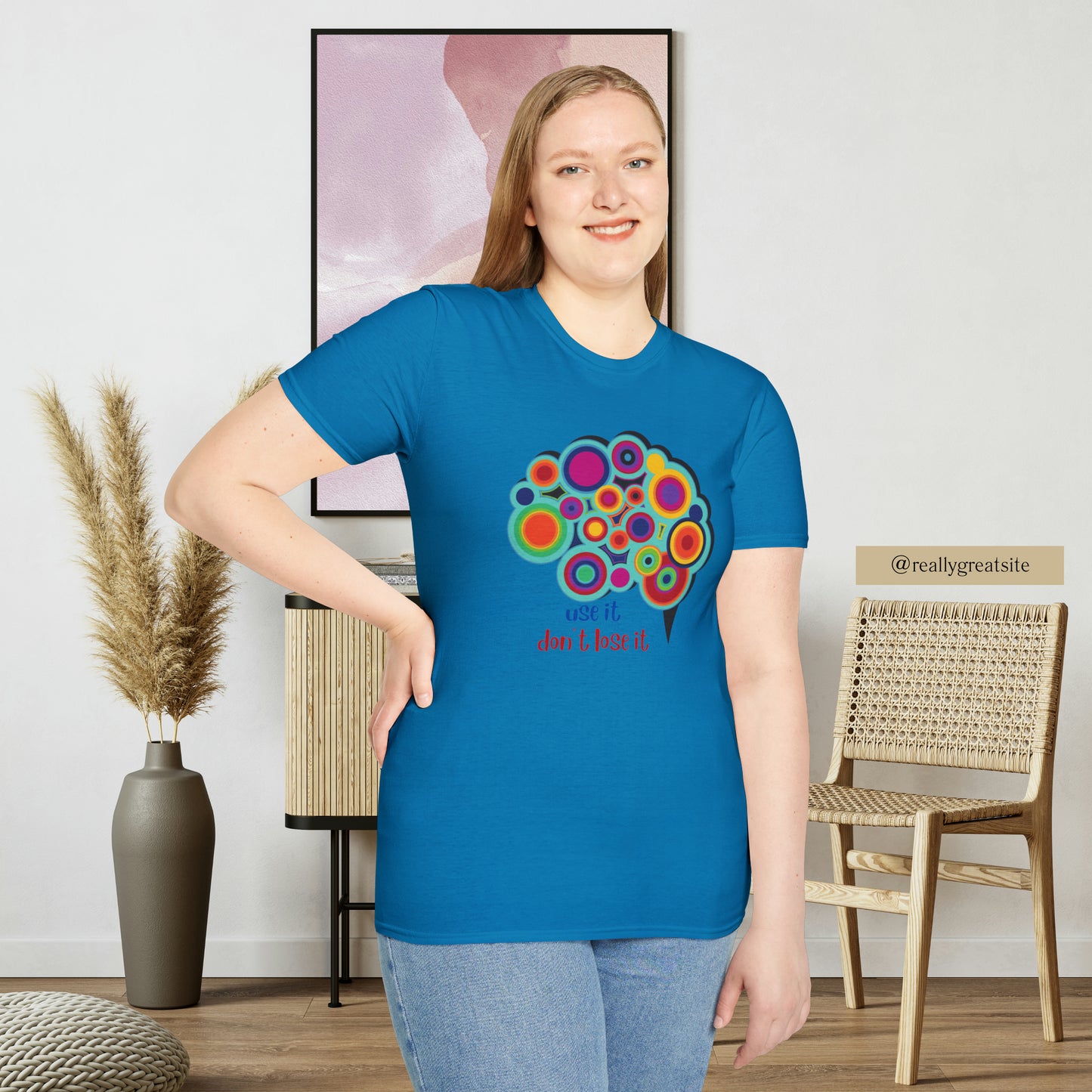 Beautifully designed brain with “use it don’t lose it” message below it on this Unisex Softstyle T-Shirt.