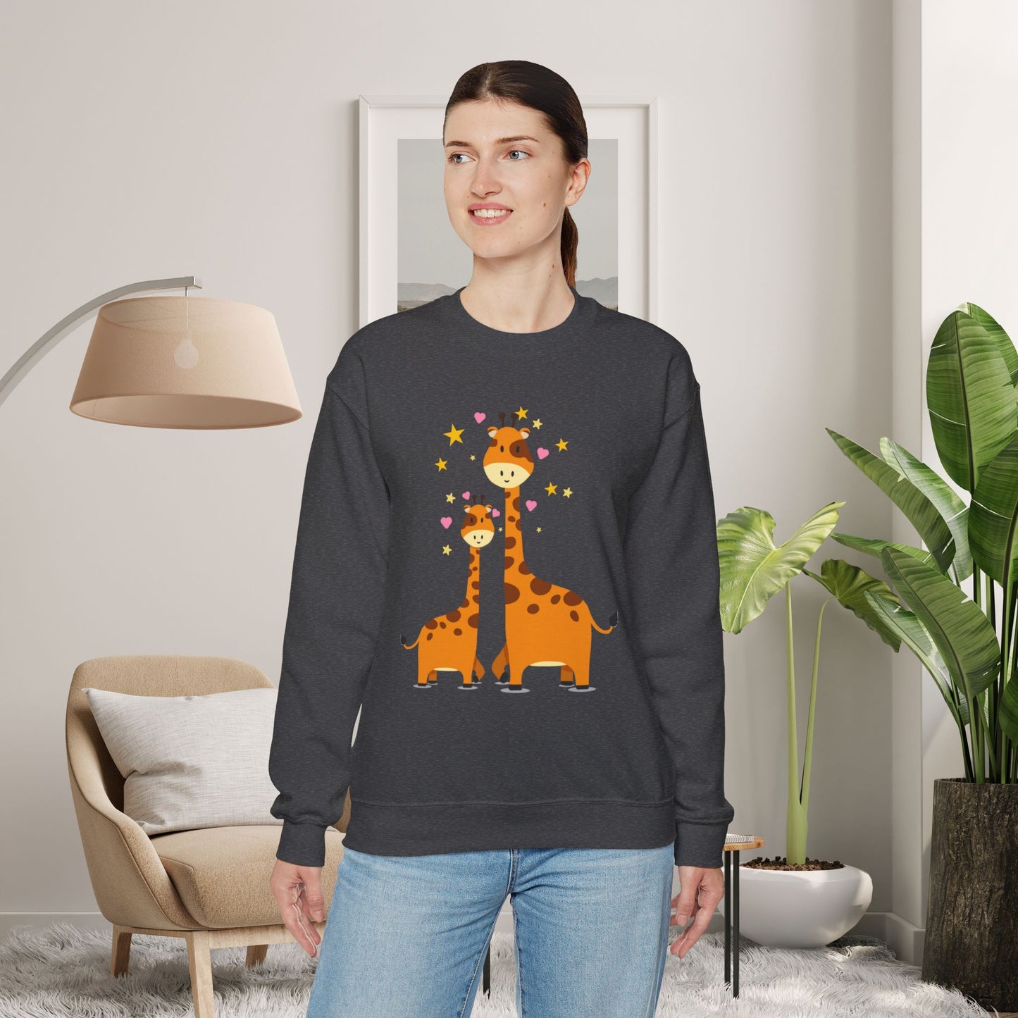 Love giraffes? Here’s the sweatshirt for you, celebrating adorable mama and baby giraffe love! Give the gift of this Unisex Heavy Blend™ Crewneck Sweatshirt or get one for yourself.