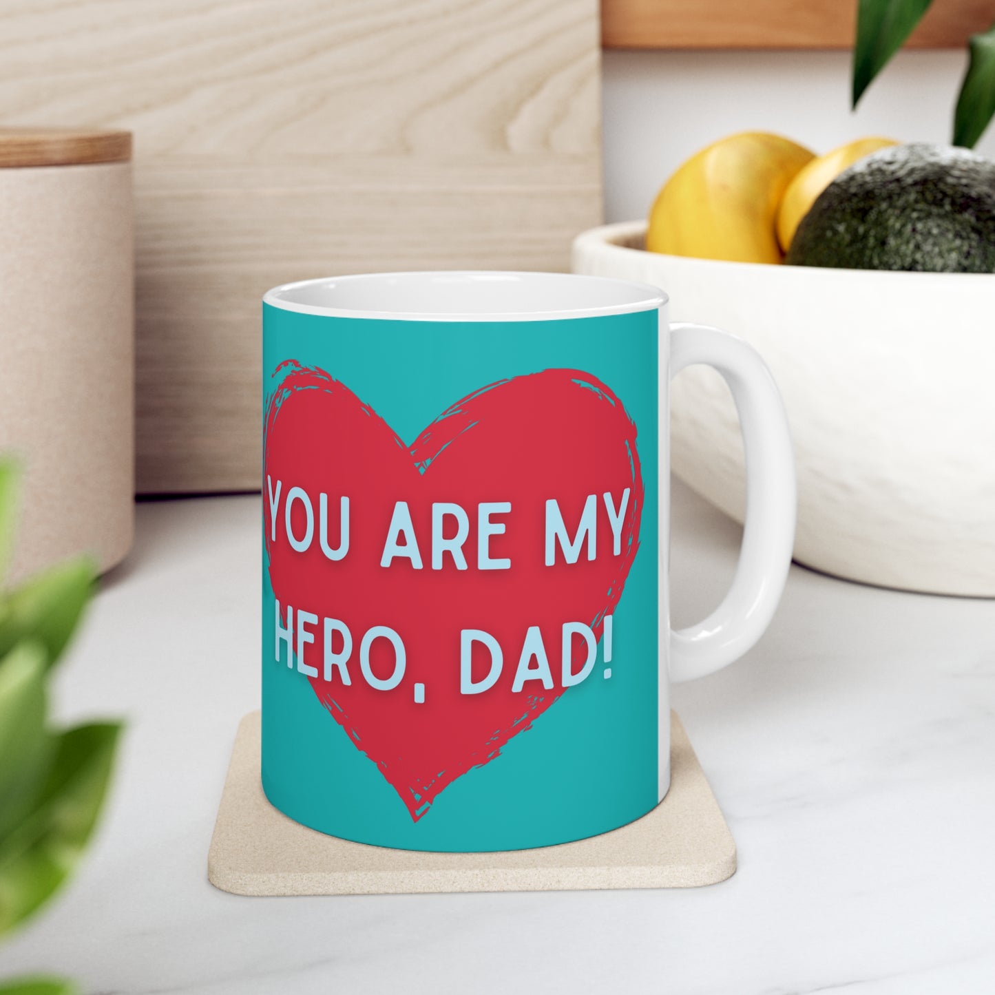 “YOU ARE MY HERO, DAD” on one side and a happy time shared by dad and daughter. Part of several mugs to choose from depending on what resonates with you.