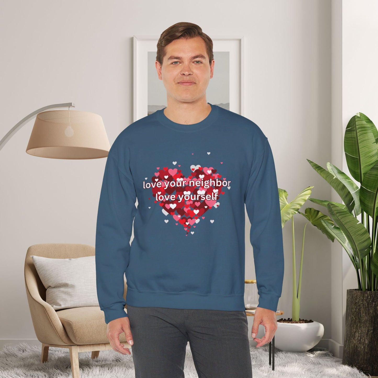 “love your neighbor love yourself” on top of a beautiful heart of hearts. Give the gift of this Unisex Heavy Blend™ Crewneck Sweatshirt or get one for yourself.