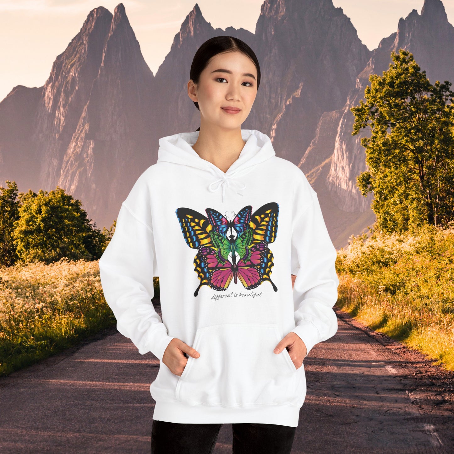 Diversity is celebrated on this butterflies filled “different is beautiful" Unisex Heavy Blend™ Hooded Sweatshirt