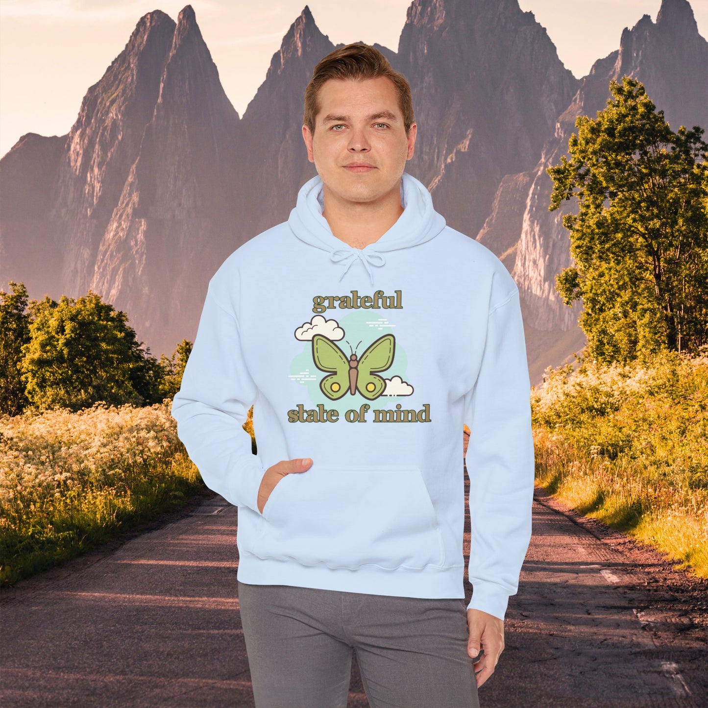 Grateful state of mind around a simple butterfly design on this Unisex Heavy Blend™ Hooded Sweatshirt