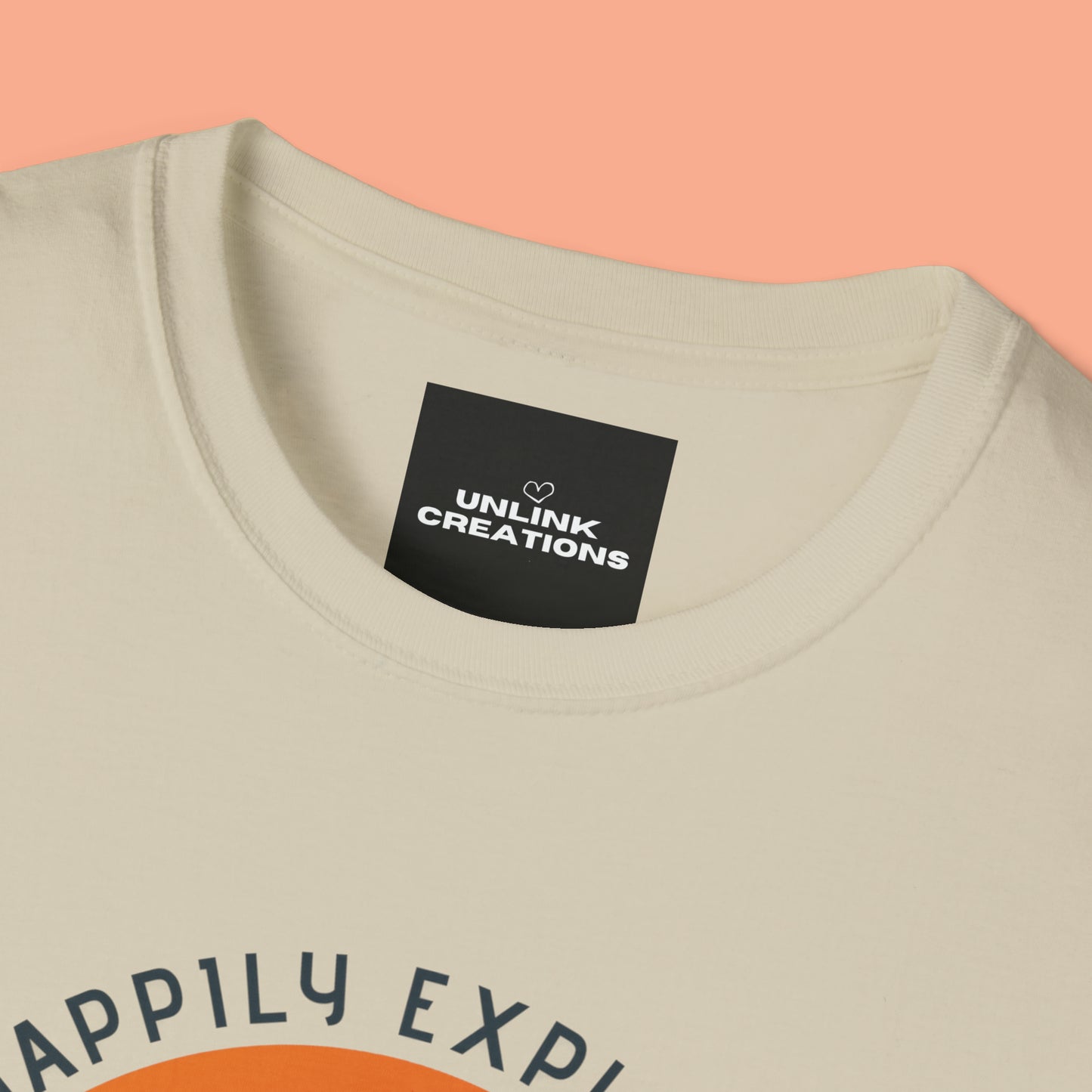 “LIVE HAPPILY EXPLORE MORE” message on this mountain sports inspired Unisex Softstyle T-Shirt.