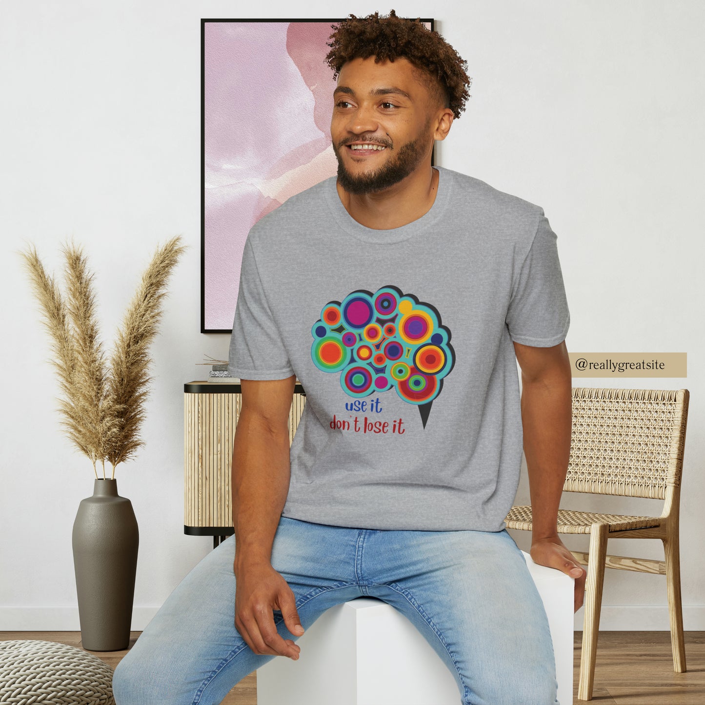 Beautifully designed brain with “use it don’t lose it” message below it on this Unisex Softstyle T-Shirt.