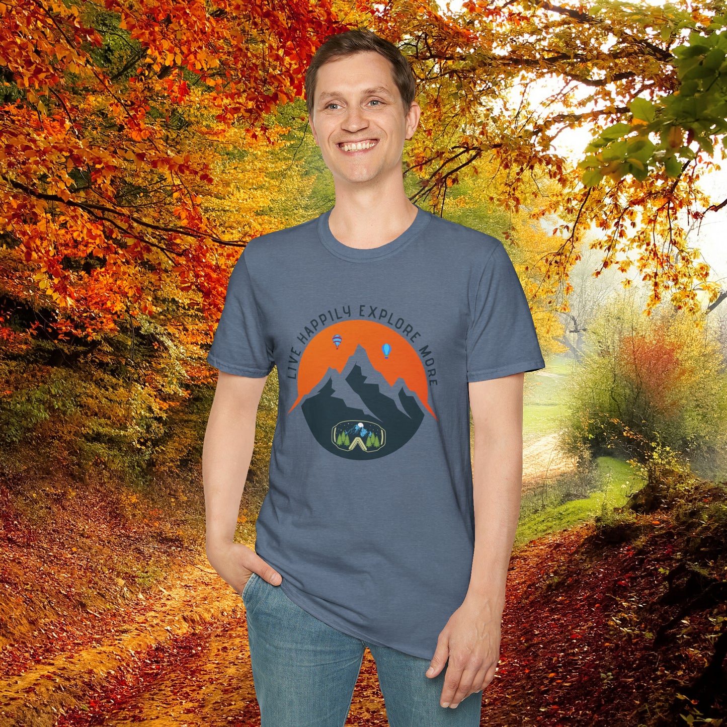 “LIVE HAPPILY EXPLORE MORE” message on this mountain sports inspired Unisex Softstyle T-Shirt.