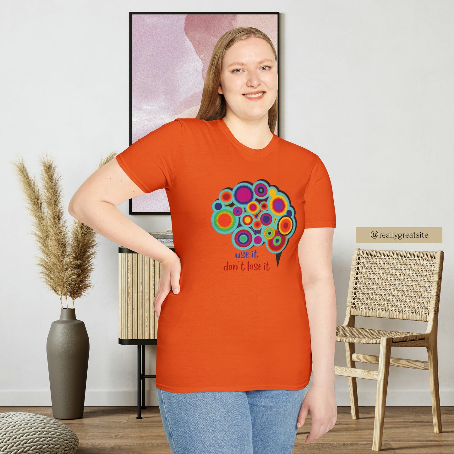 Beautifully designed brain with “use it don’t lose it” message below it on this Unisex Softstyle T-Shirt.