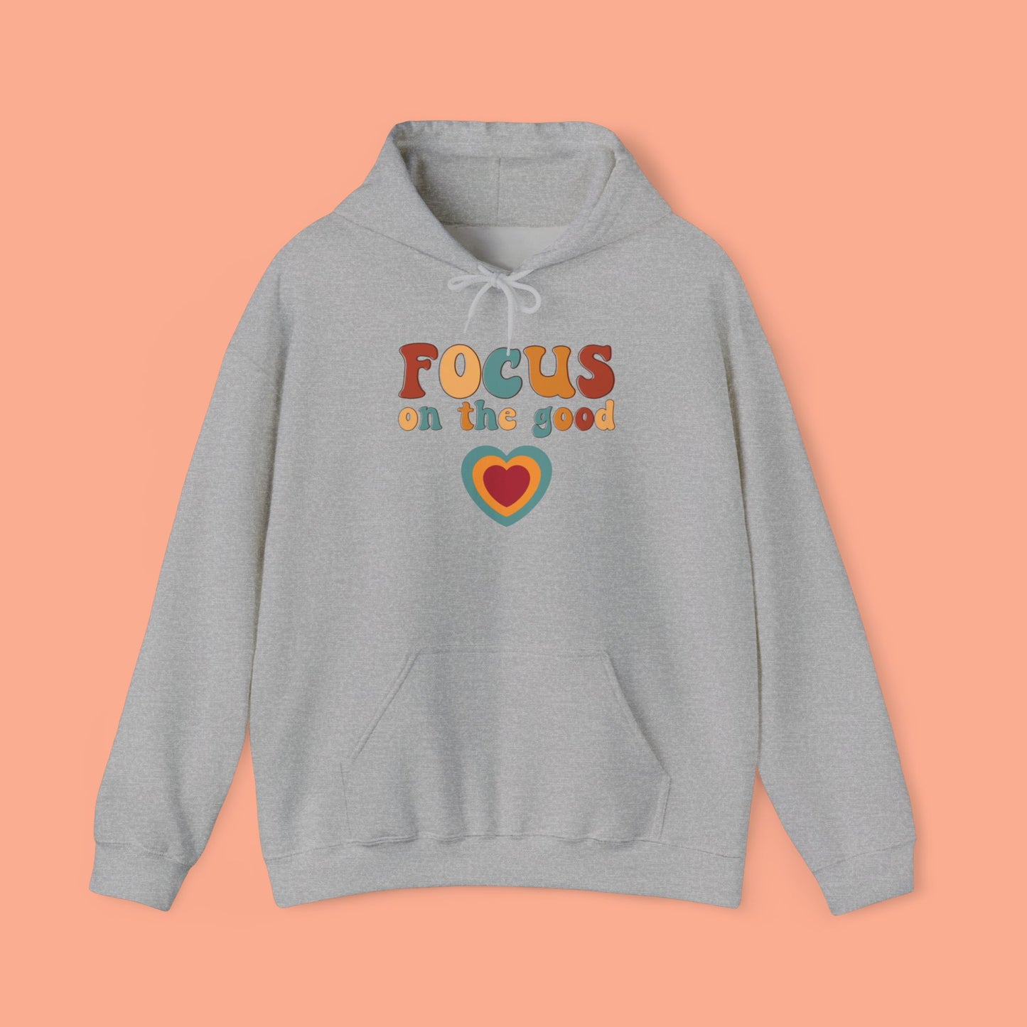 A colorful Focus on the good message on this Unisex Heavy Blend™ Hooded Sweatshirt