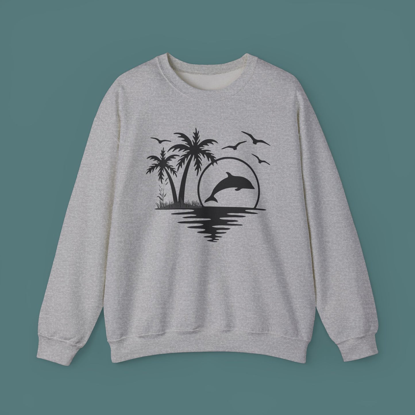 Silhouettes of palm trees, playful dolphin, and the ocean water make this cozy sweatshirt. Give the gift of this Unisex Heavy Blend™ Crewneck Sweatshirt or get one for yourself.