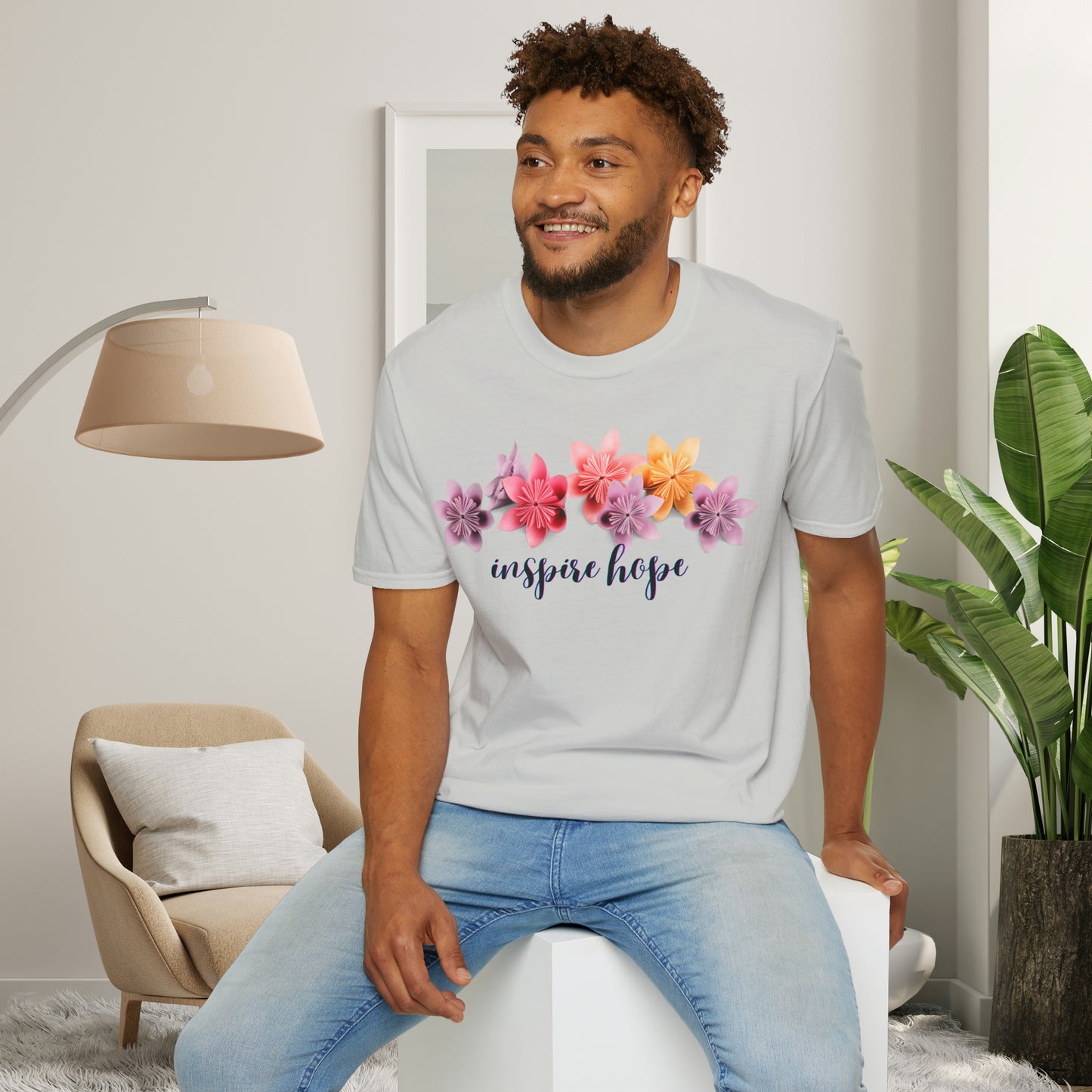 Our ability to “inspire hope” in others begins with us recognizing our ability to do so. Origami flowers go with this message on this Unisex Softstyle T-Shirt.