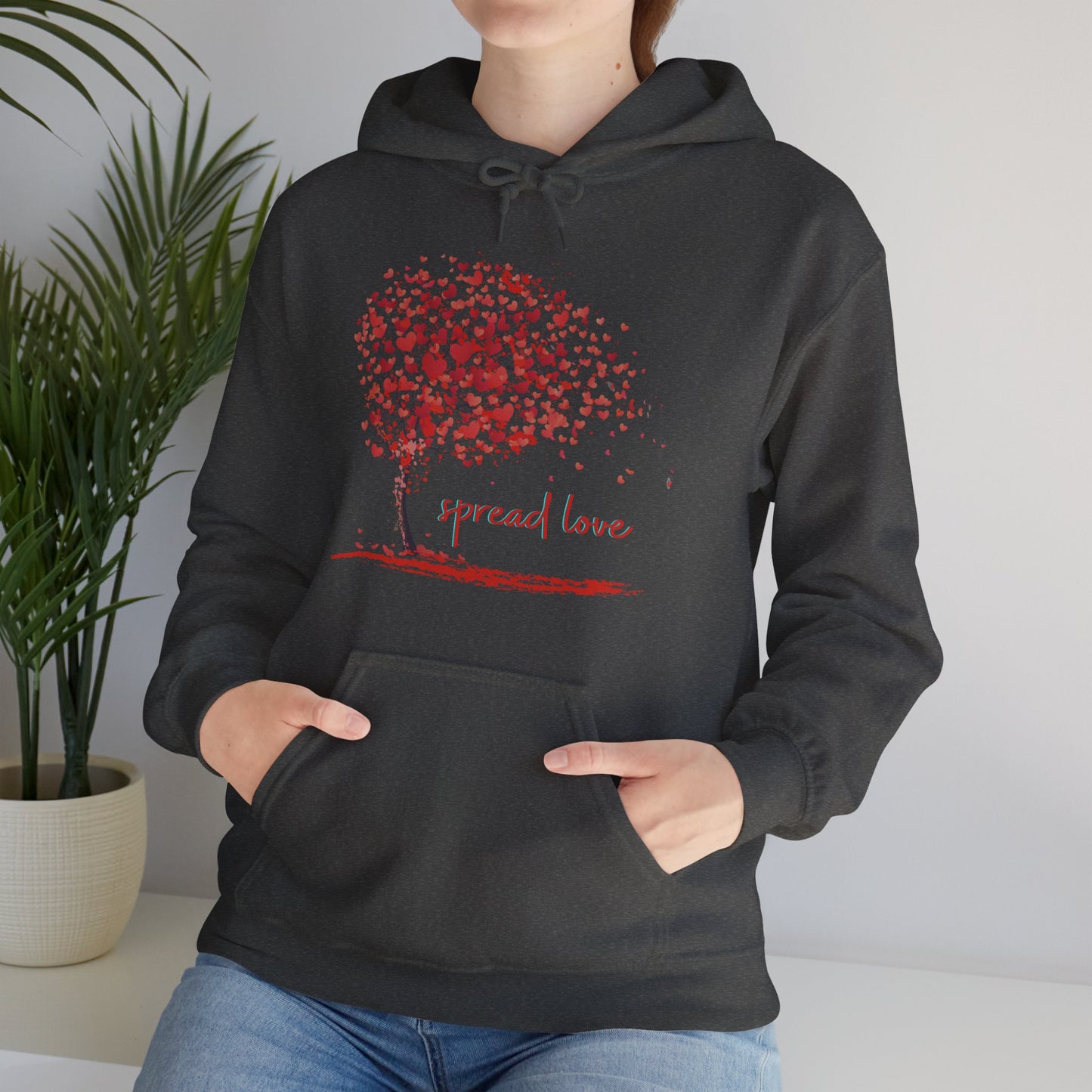 Spread love is the message on this heart filled tree designed Unisex Heavy Blend™ Hooded Sweatshirt