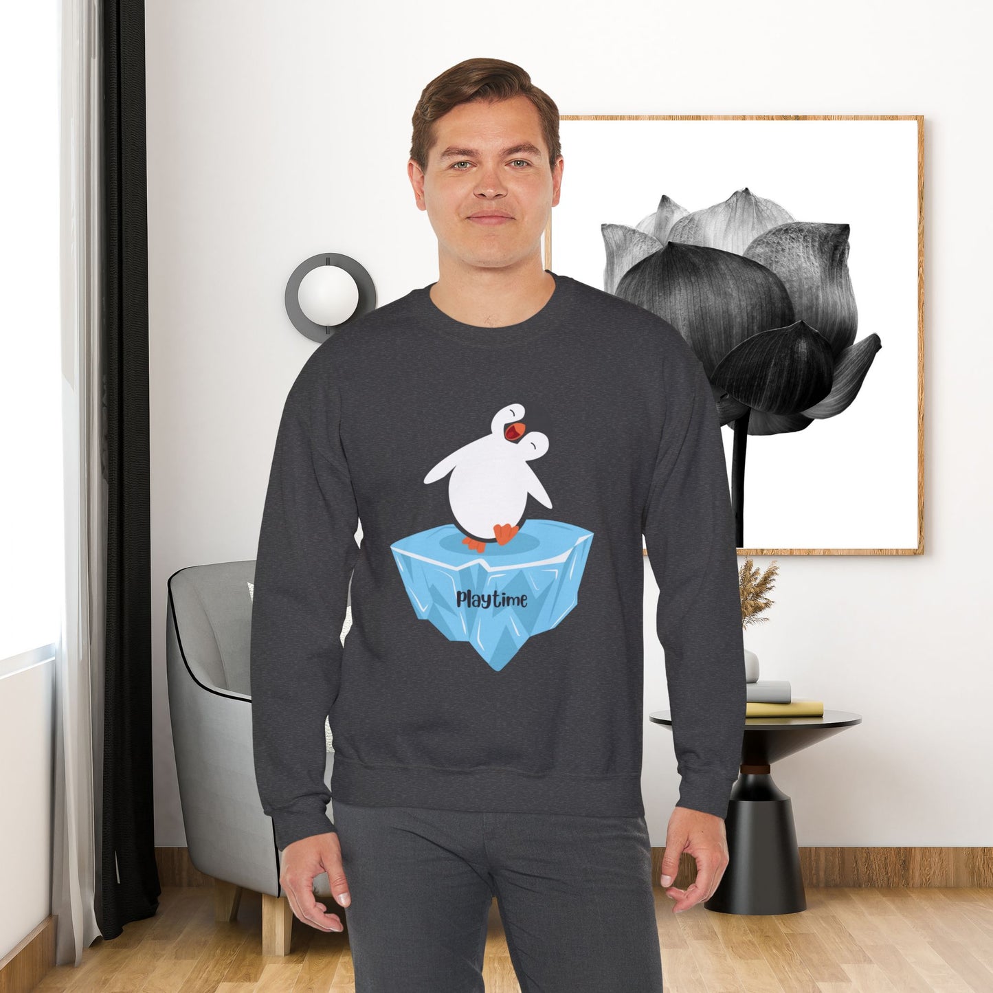 Playtime! Cute and happy penguin on an iceberg design. Give the gift of this Unisex Heavy Blend™ Crewneck Sweatshirt or get one for yourself.