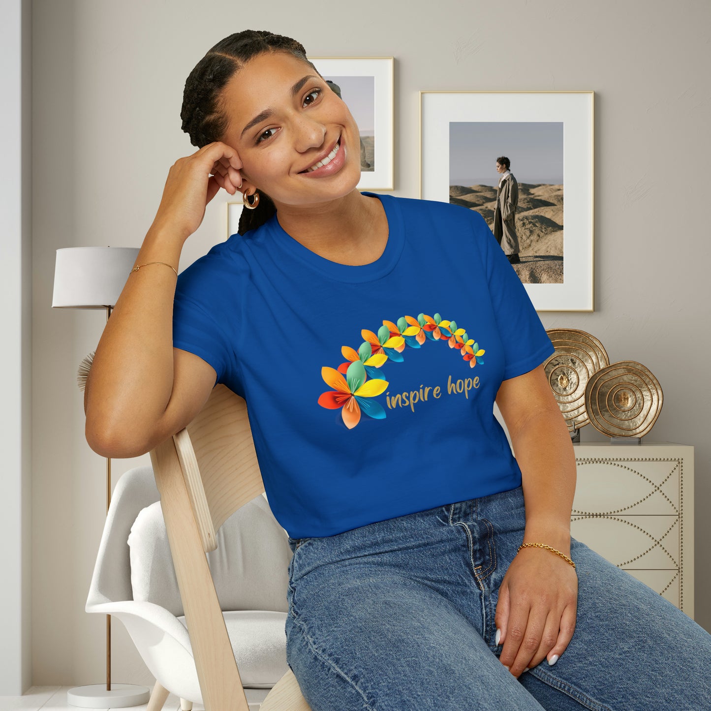 A beautiful origami style flowers in rainbow formation with “inspire hope” below it. We find hope in each other, that is part of our humanity. Be that inspiration, one person at a time. This is a Unisex Softstyle T-Shirt.