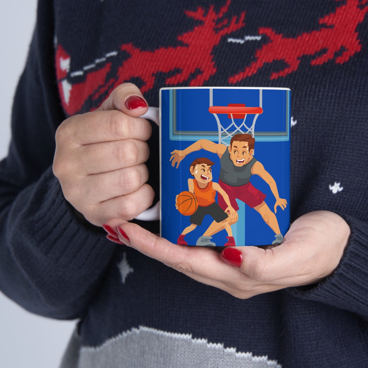 “BEST DAD EVER” on one side and dad happily playing basketball with his son. Part of several mugs to choose from depending on what resonates with you.