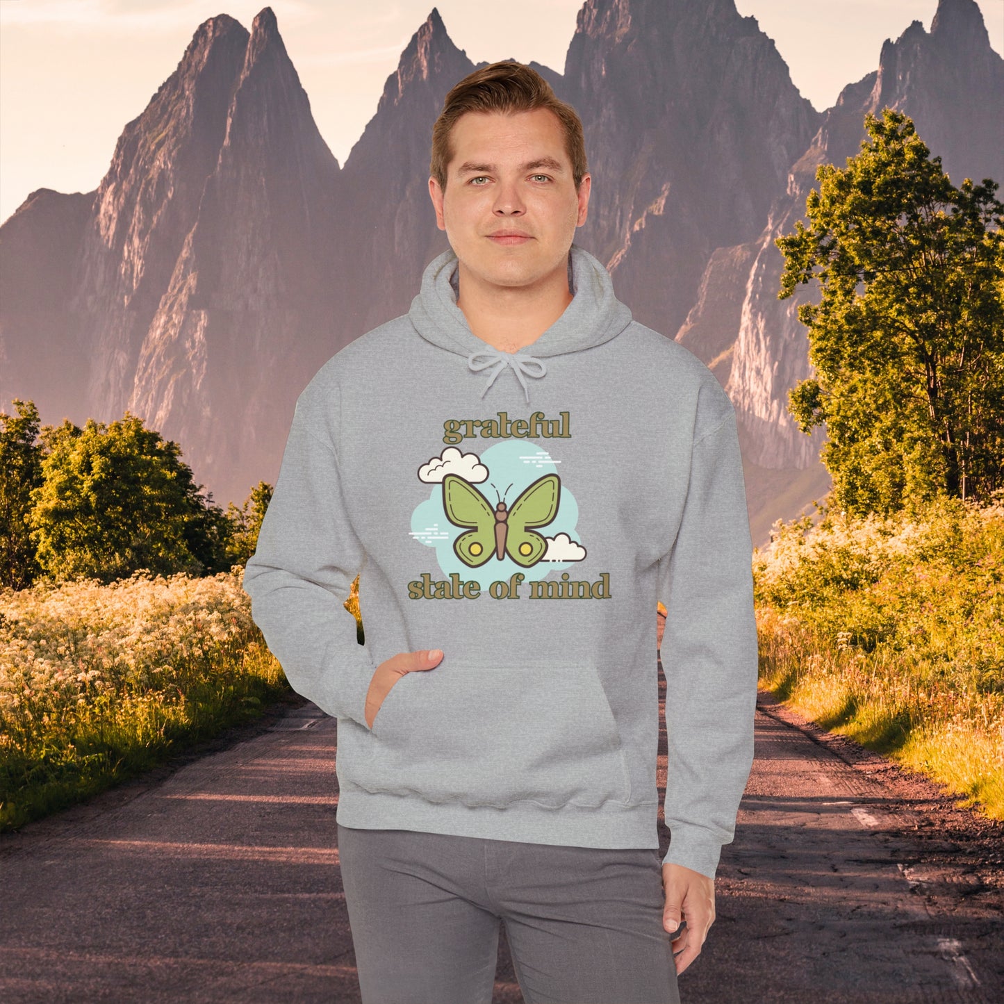 Grateful state of mind around a simple butterfly design on this Unisex Heavy Blend™ Hooded Sweatshirt