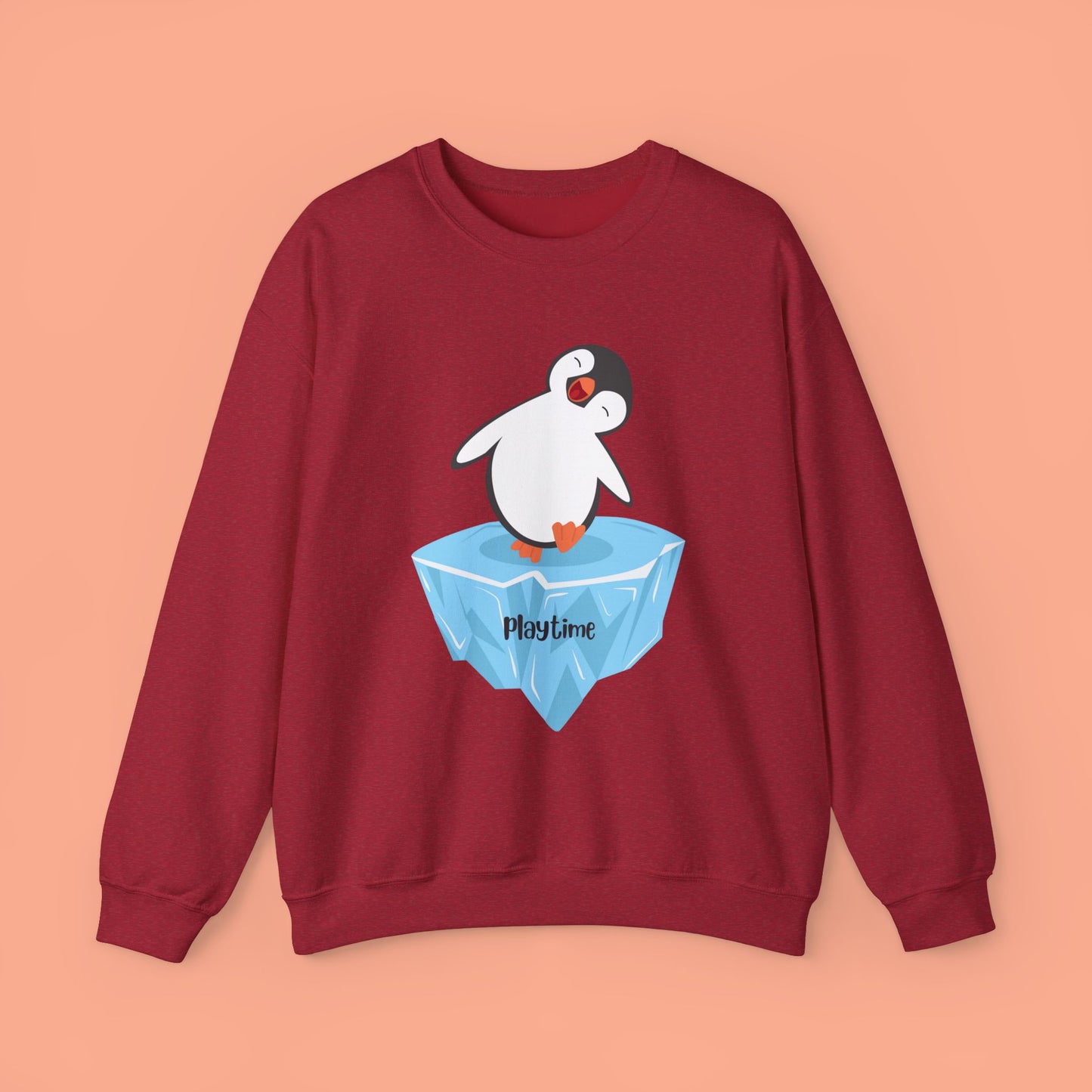 Playtime! Cute and happy penguin on an iceberg design. Give the gift of this Unisex Heavy Blend™ Crewneck Sweatshirt or get one for yourself.