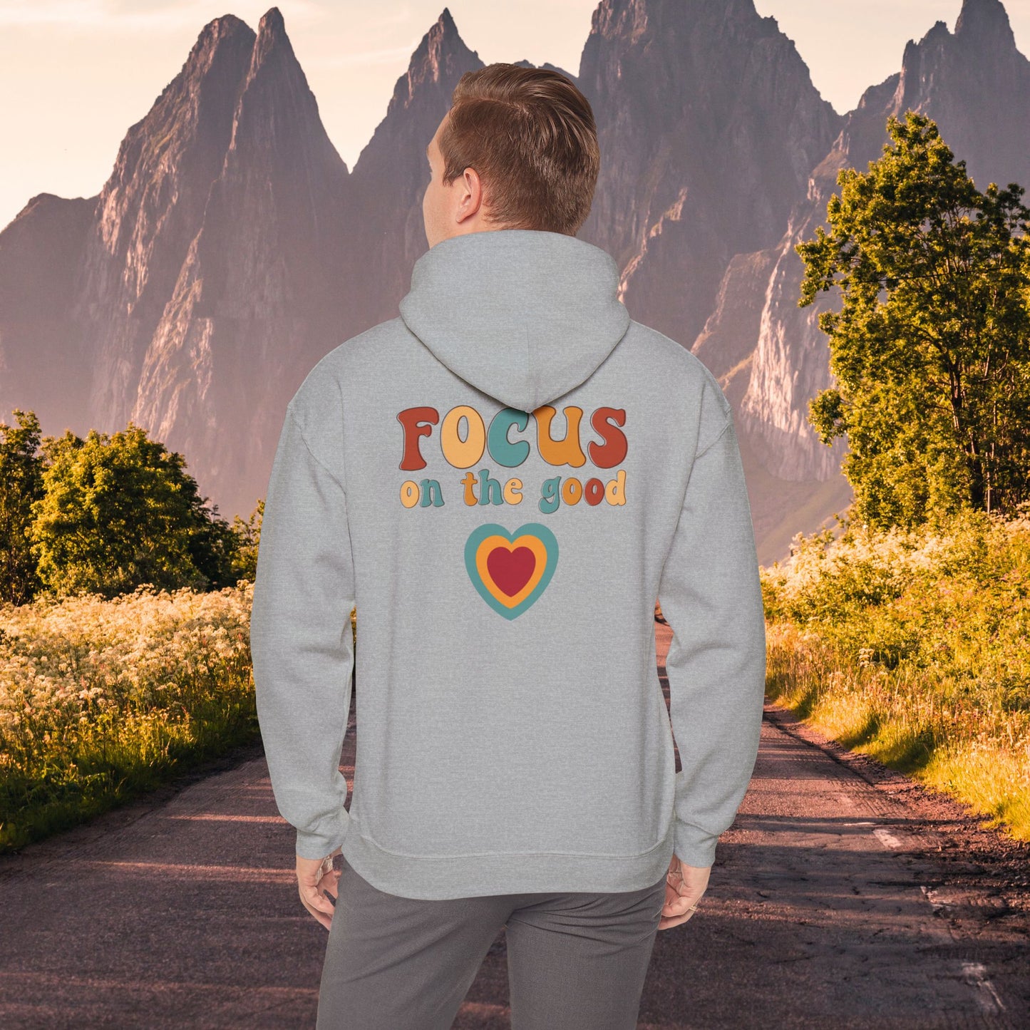 A colorful Focus on the good message on this Unisex Heavy Blend™ Hooded Sweatshirt