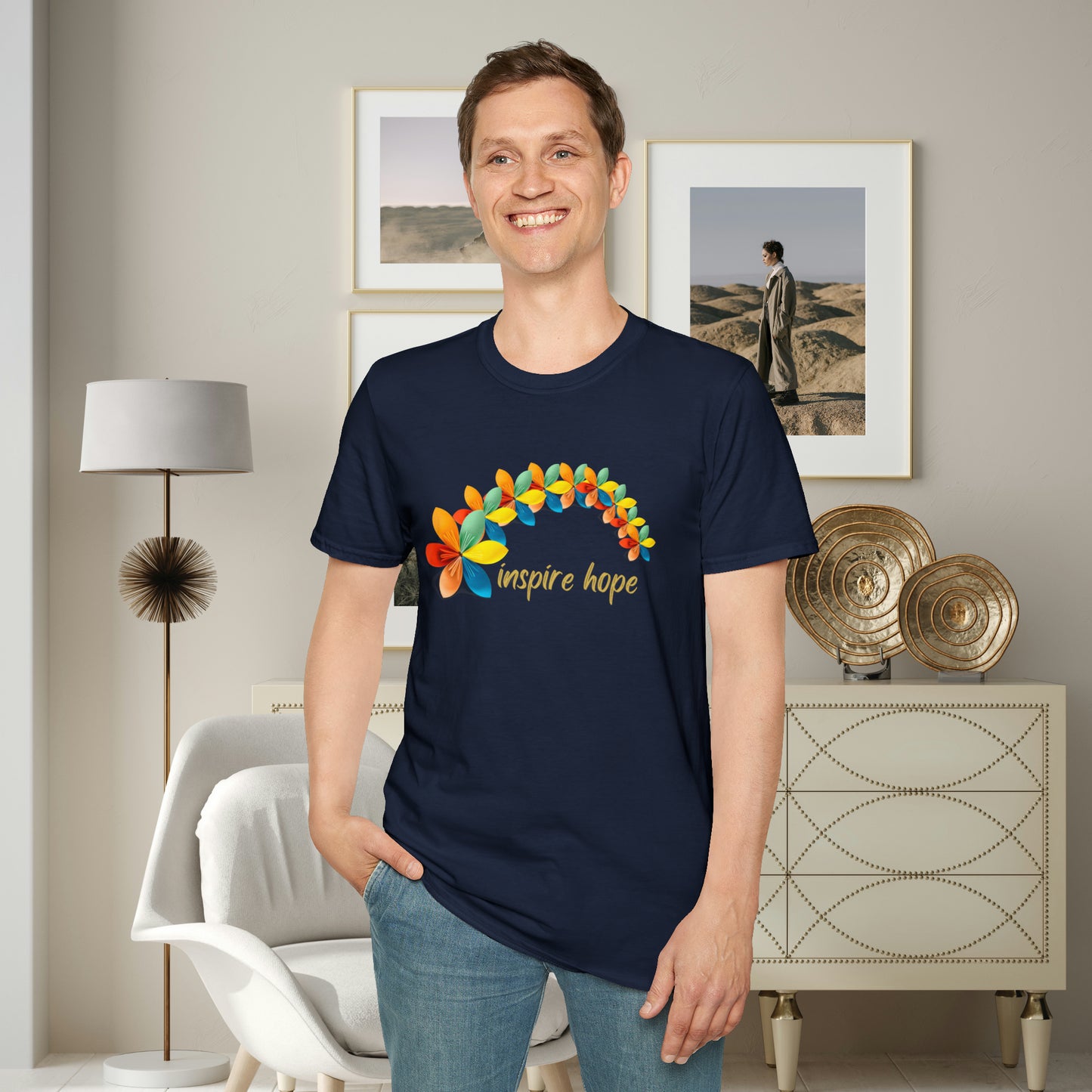 A beautiful origami style flowers in rainbow formation with “inspire hope” below it. We find hope in each other, that is part of our humanity. Be that inspiration, one person at a time. This is a Unisex Softstyle T-Shirt.