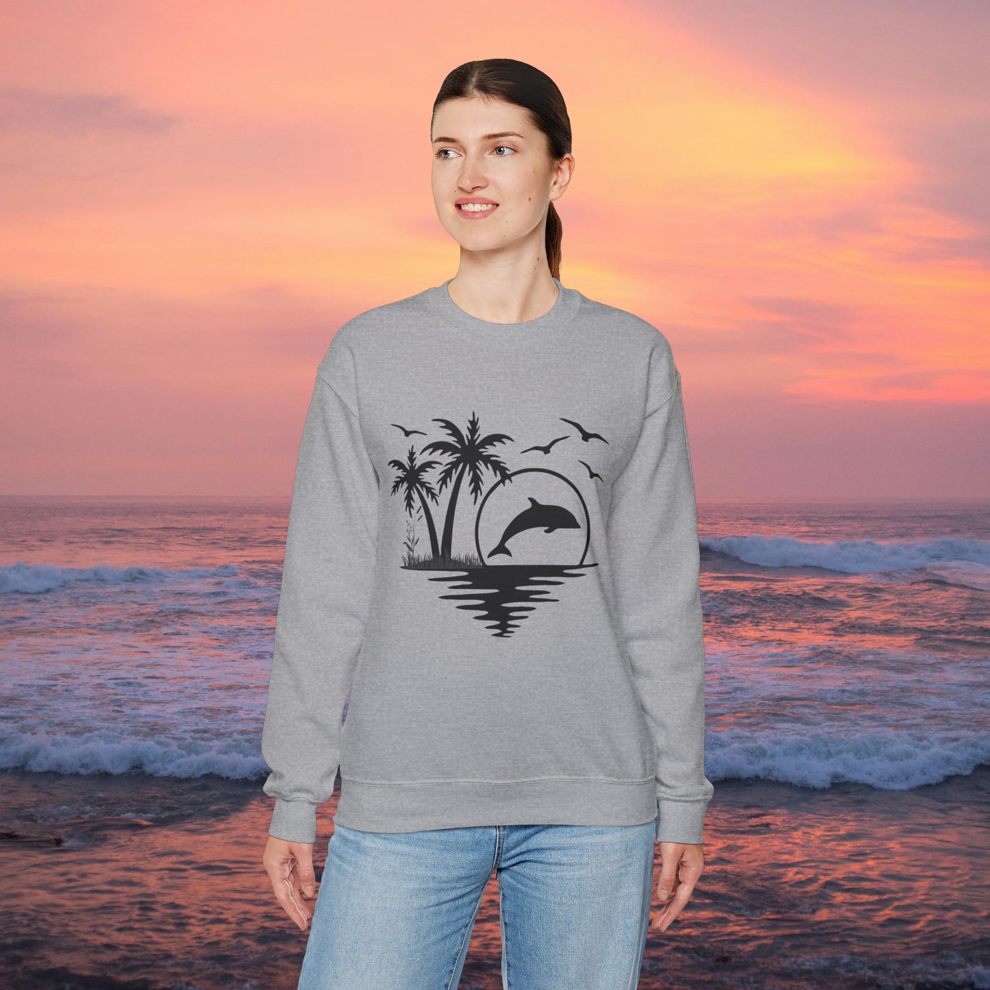 Silhouettes of palm trees, playful dolphin, and the ocean water make this cozy sweatshirt. Give the gift of this Unisex Heavy Blend™ Crewneck Sweatshirt or get one for yourself.