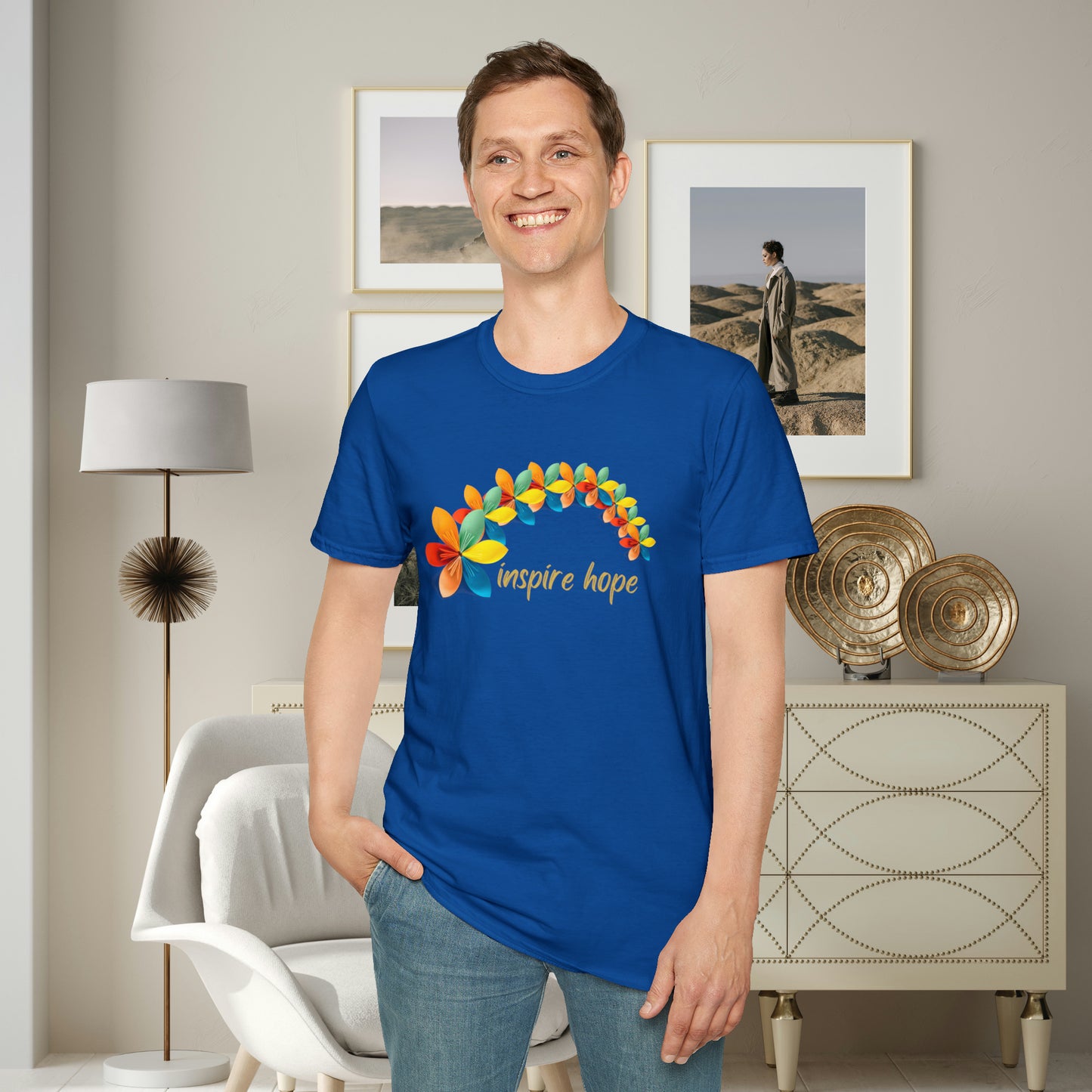 A beautiful origami style flowers in rainbow formation with “inspire hope” below it. We find hope in each other, that is part of our humanity. Be that inspiration, one person at a time. This is a Unisex Softstyle T-Shirt.