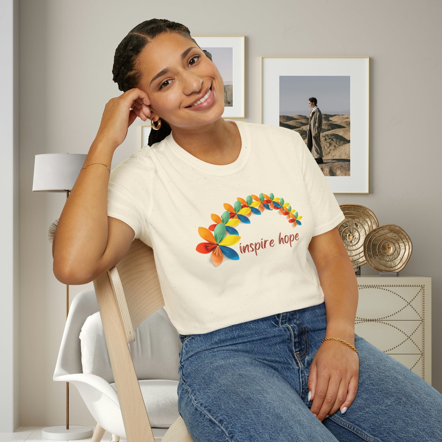 A beautiful origami style flowers in rainbow formation with “inspire hope” below it. We find hope in each other, that is part of our humanity. Be that inspiration, one person at a time. This is a Unisex Softstyle T-Shirt.