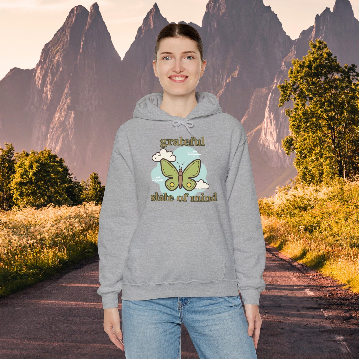 Grateful state of mind around a simple butterfly design on this Unisex Heavy Blend™ Hooded Sweatshirt