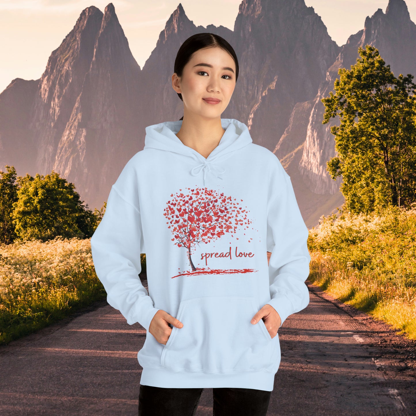 Spread love is the message on this heart filled tree designed Unisex Heavy Blend™ Hooded Sweatshirt