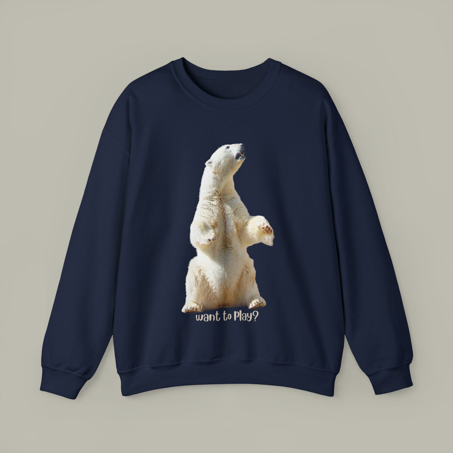 Impressive polar bear asking “Want to play?"! Play like you mean it! Give the gift of this Unisex Heavy Blend™ Crewneck Sweatshirt or get one for yourself.