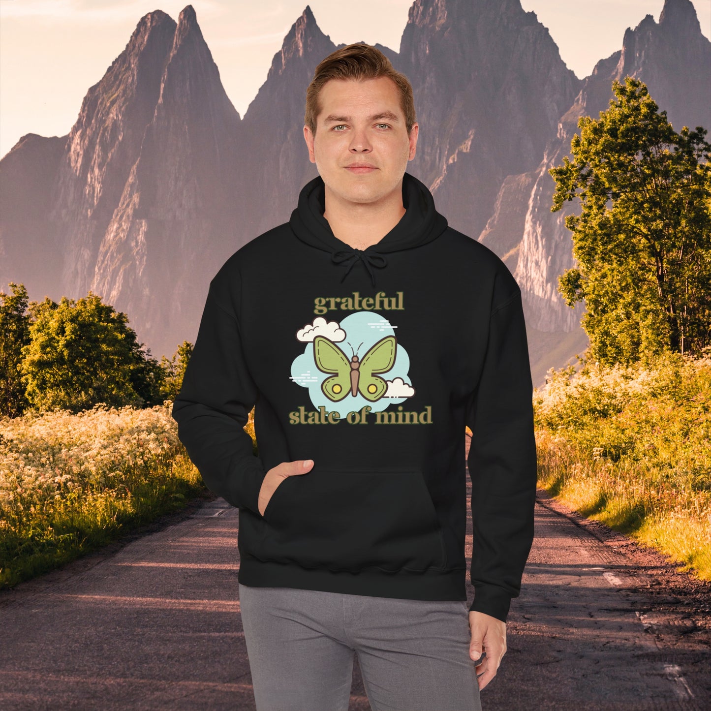 Grateful state of mind around a simple butterfly design on this Unisex Heavy Blend™ Hooded Sweatshirt