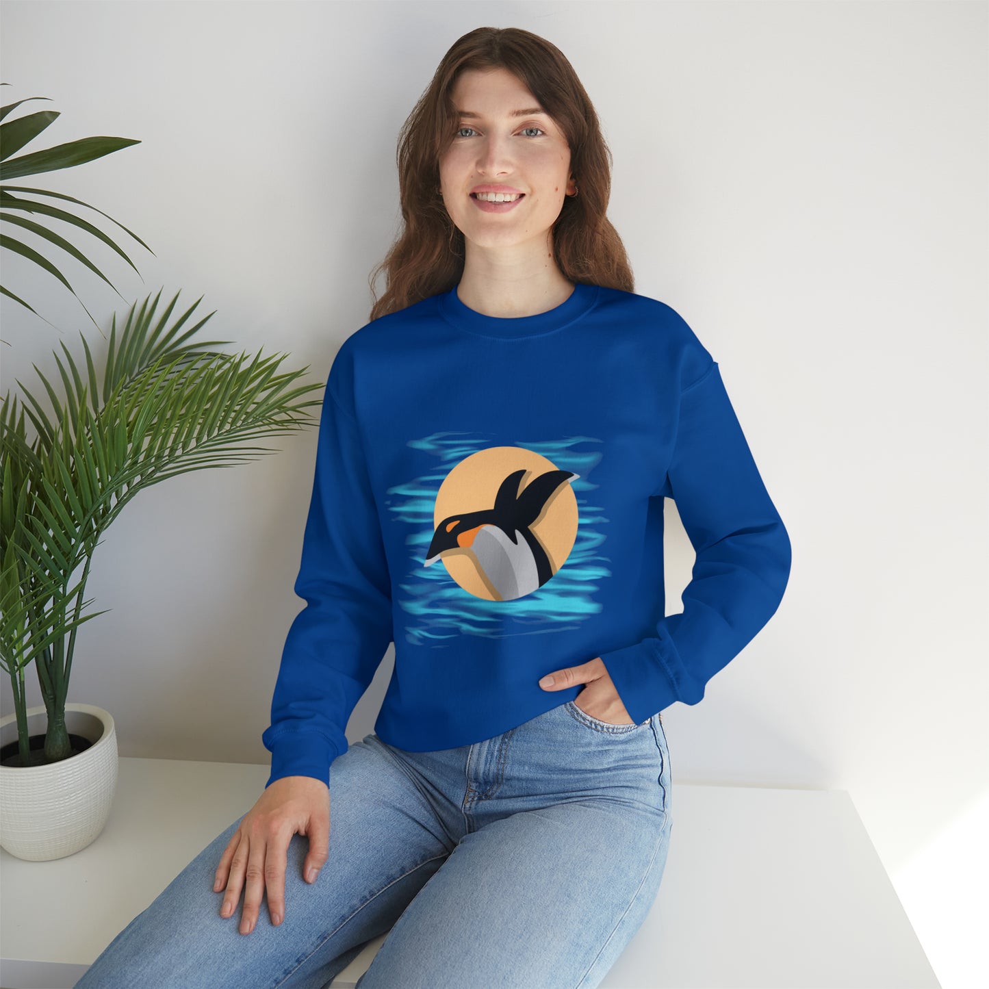 Colorful and playful penguin retro design. Give the gift of this Unisex Heavy Blend™ Crewneck Sweatshirt or get one for yourself.