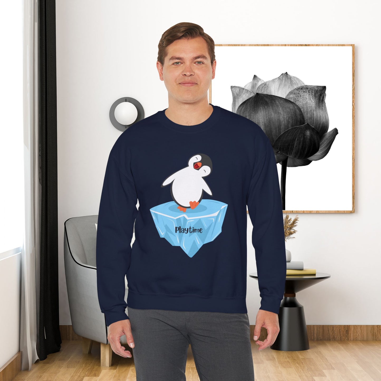 Playtime! Cute and happy penguin on an iceberg design. Give the gift of this Unisex Heavy Blend™ Crewneck Sweatshirt or get one for yourself.