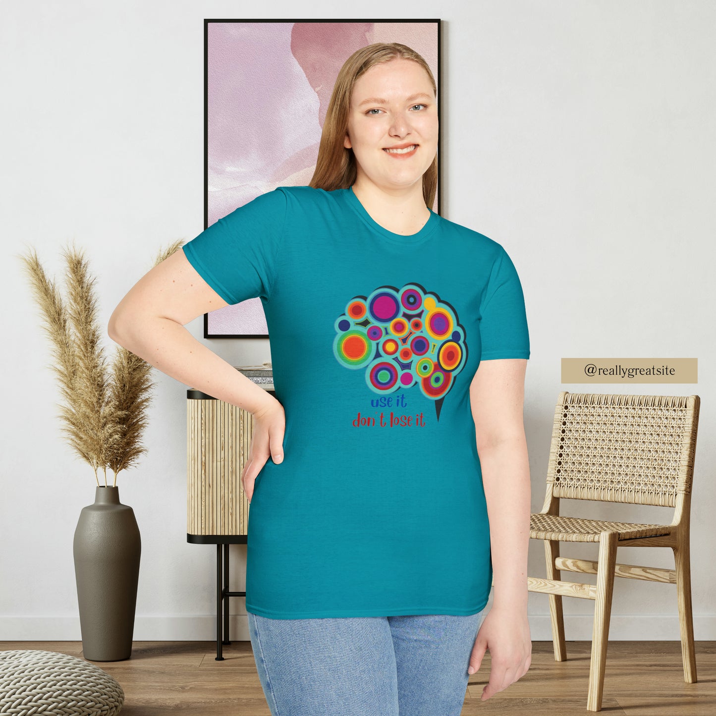 Beautifully designed brain with “use it don’t lose it” message below it on this Unisex Softstyle T-Shirt.