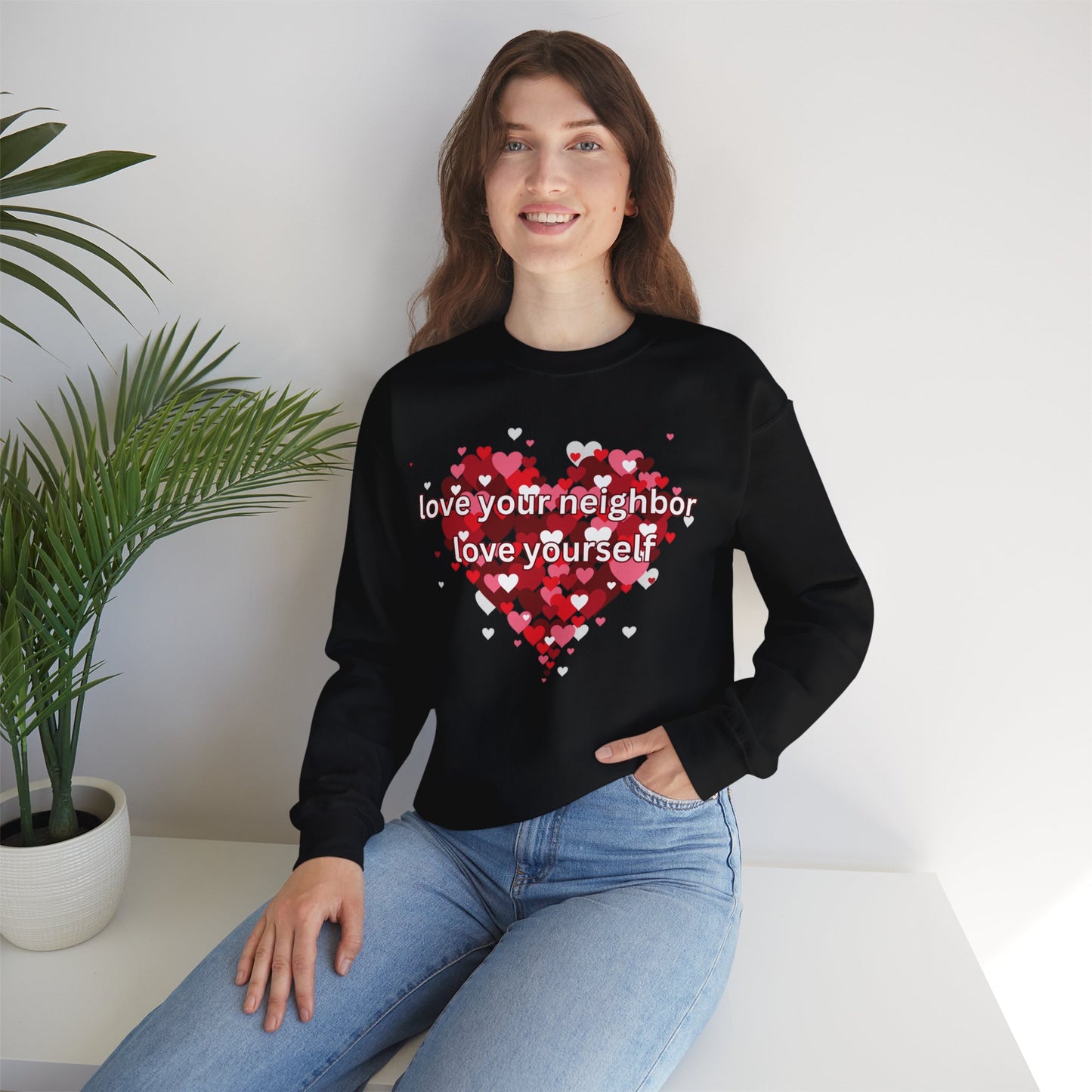 “love your neighbor love yourself” on top of a beautiful heart of hearts. Give the gift of this Unisex Heavy Blend™ Crewneck Sweatshirt or get one for yourself.