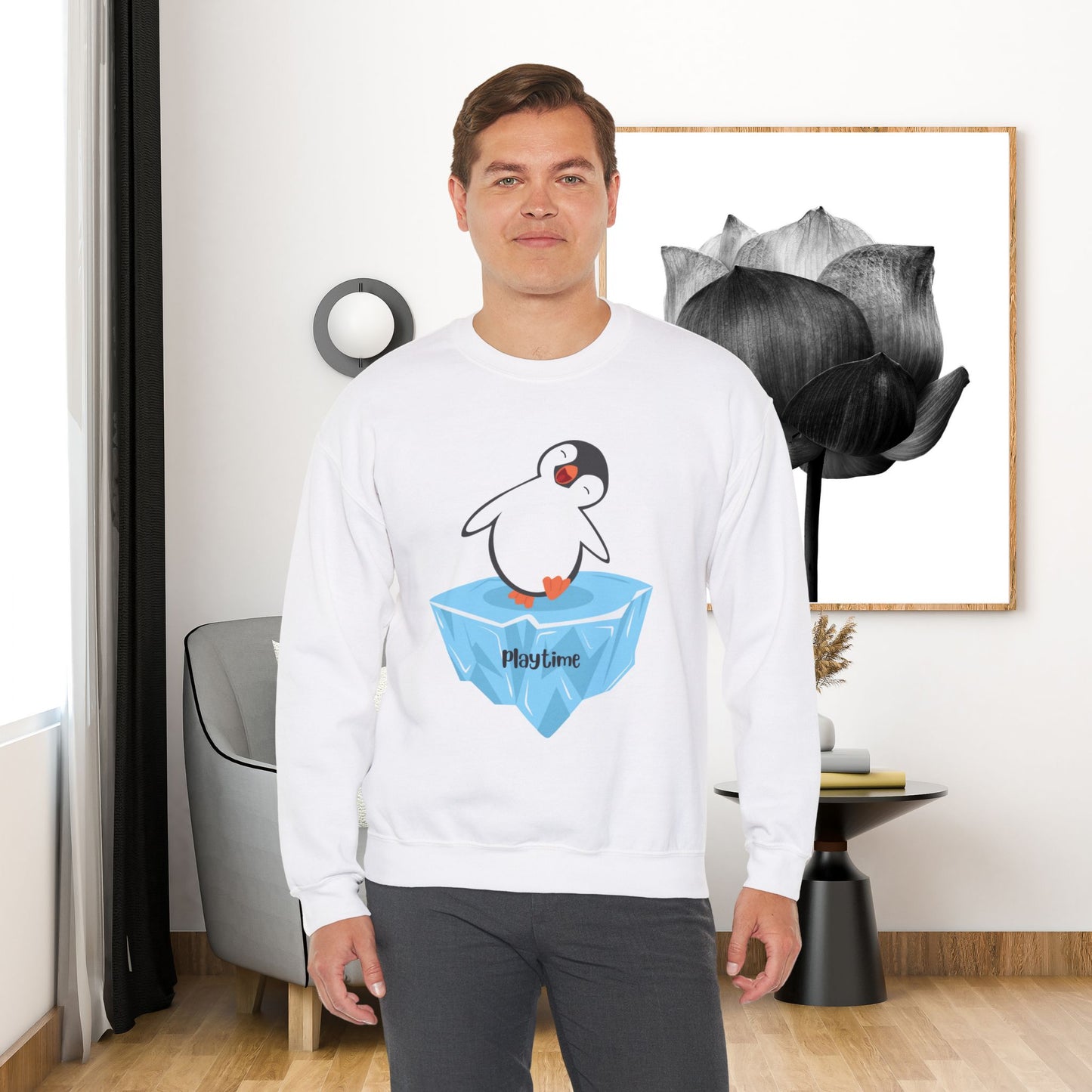 Playtime! Cute and happy penguin on an iceberg design. Give the gift of this Unisex Heavy Blend™ Crewneck Sweatshirt or get one for yourself.