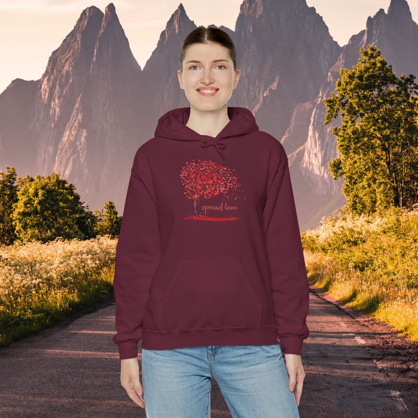 Spread love is the message on this heart filled tree designed Unisex Heavy Blend™ Hooded Sweatshirt