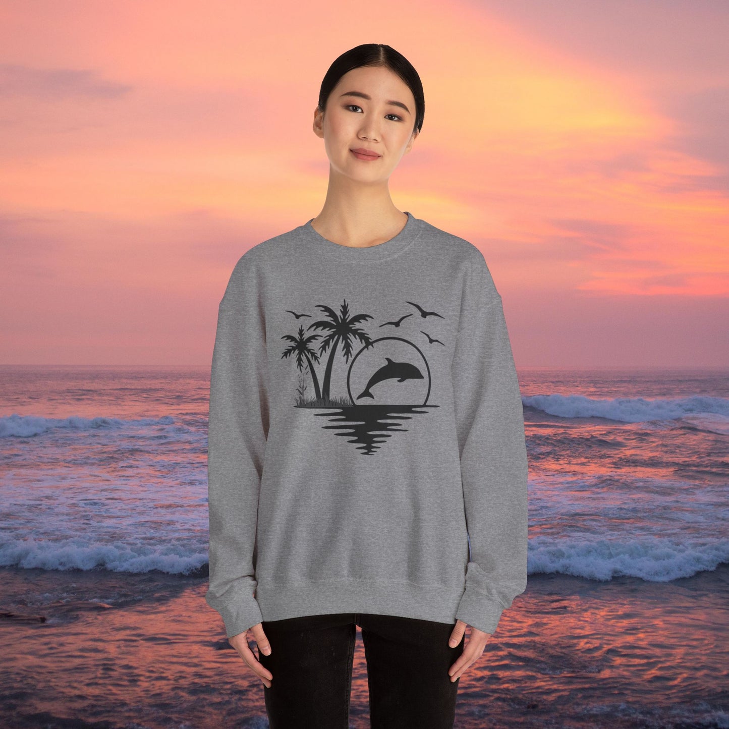 Silhouettes of palm trees, playful dolphin, and the ocean water make this cozy sweatshirt. Give the gift of this Unisex Heavy Blend™ Crewneck Sweatshirt or get one for yourself.