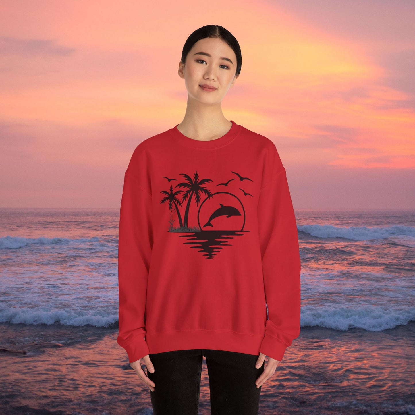 Silhouettes of palm trees, playful dolphin, and the ocean water make this cozy sweatshirt. Give the gift of this Unisex Heavy Blend™ Crewneck Sweatshirt or get one for yourself.