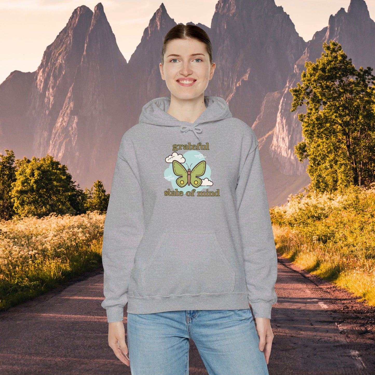 Grateful state of mind around a simple butterfly design on this Unisex Heavy Blend™ Hooded Sweatshirt