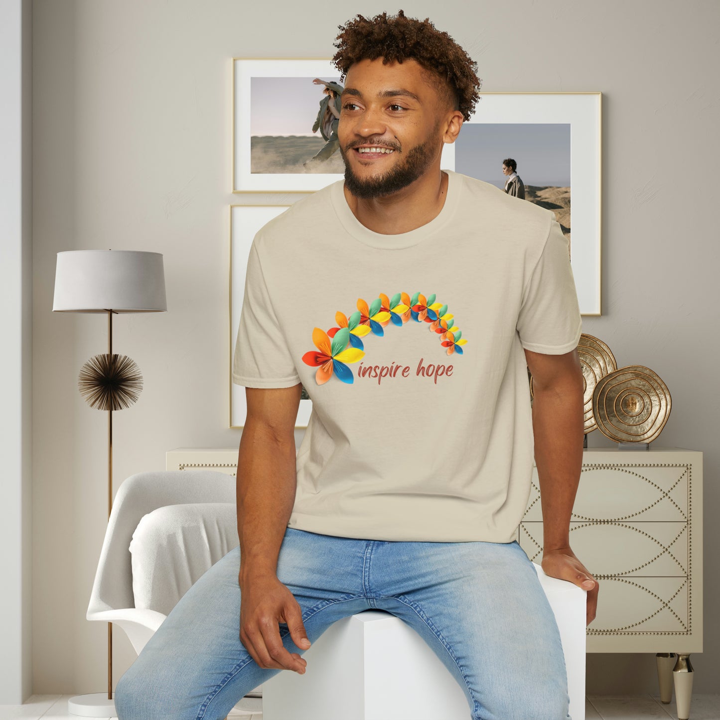 A beautiful origami style flowers in rainbow formation with “inspire hope” below it. We find hope in each other, that is part of our humanity. Be that inspiration, one person at a time. This is a Unisex Softstyle T-Shirt.