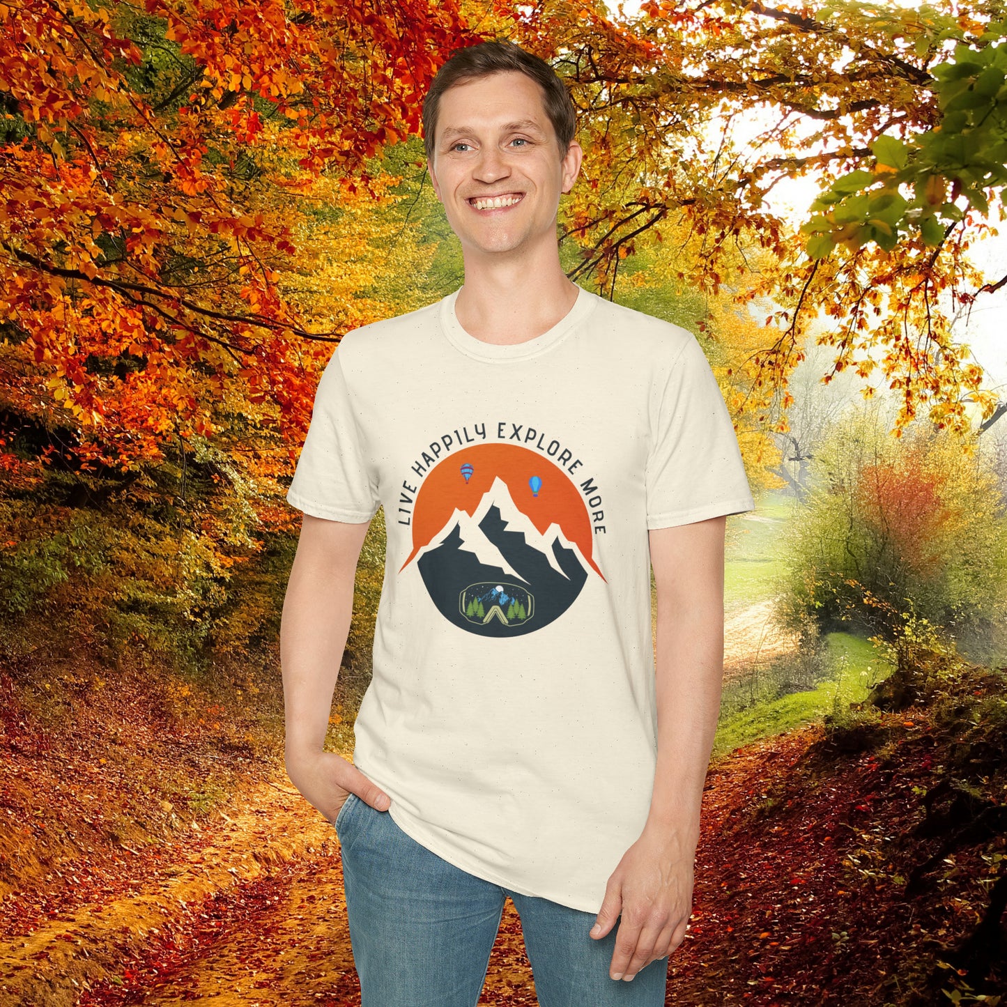 “LIVE HAPPILY EXPLORE MORE” message on this mountain sports inspired Unisex Softstyle T-Shirt.