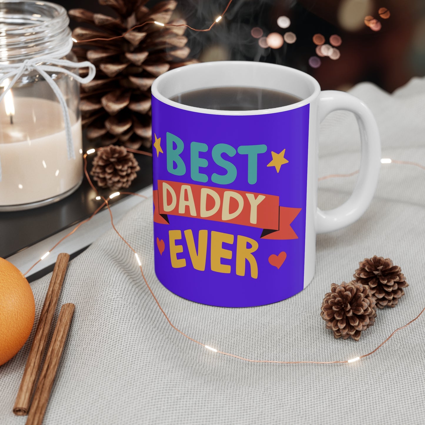 “BEST DADDY EVER” on one side and a dad teaching his child to ride a bike. Part of several mugs to choose from depending on what resonates with you.