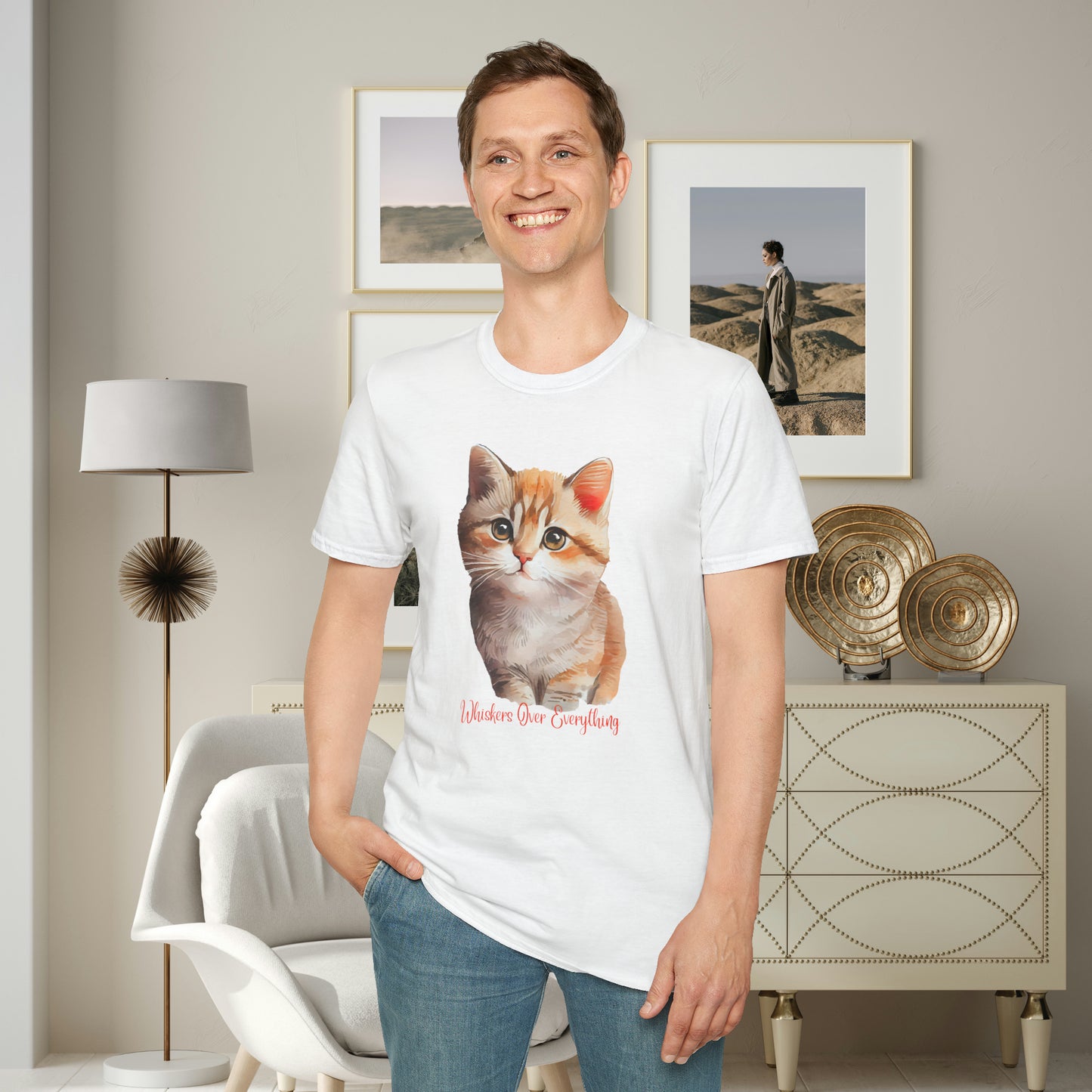 A cute cat with  “Whiskers over everything” below it on this Unisex Softstyle T-Shirt. Cat lovers get this.
