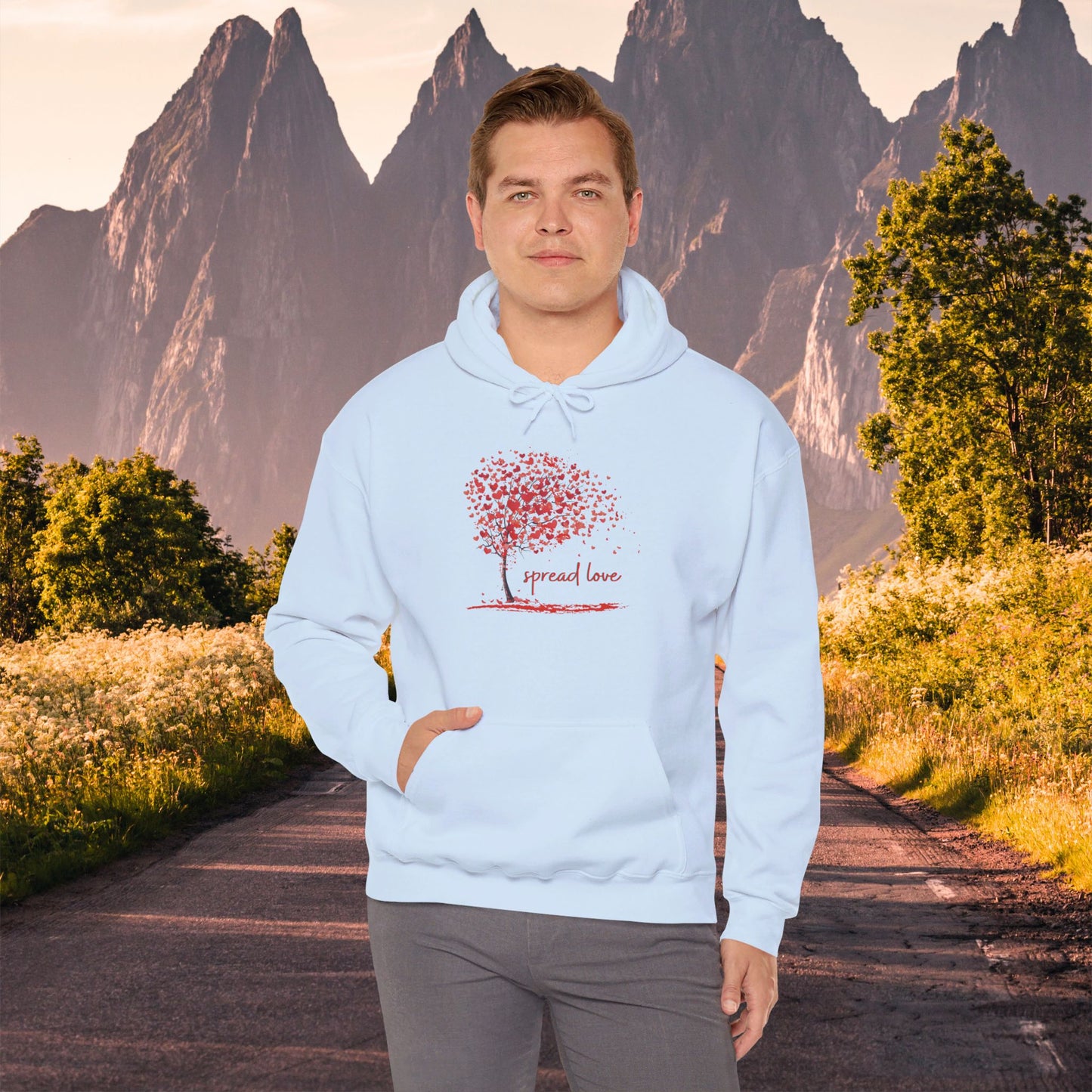 Spread love is the message on this heart filled tree designed Unisex Heavy Blend™ Hooded Sweatshirt