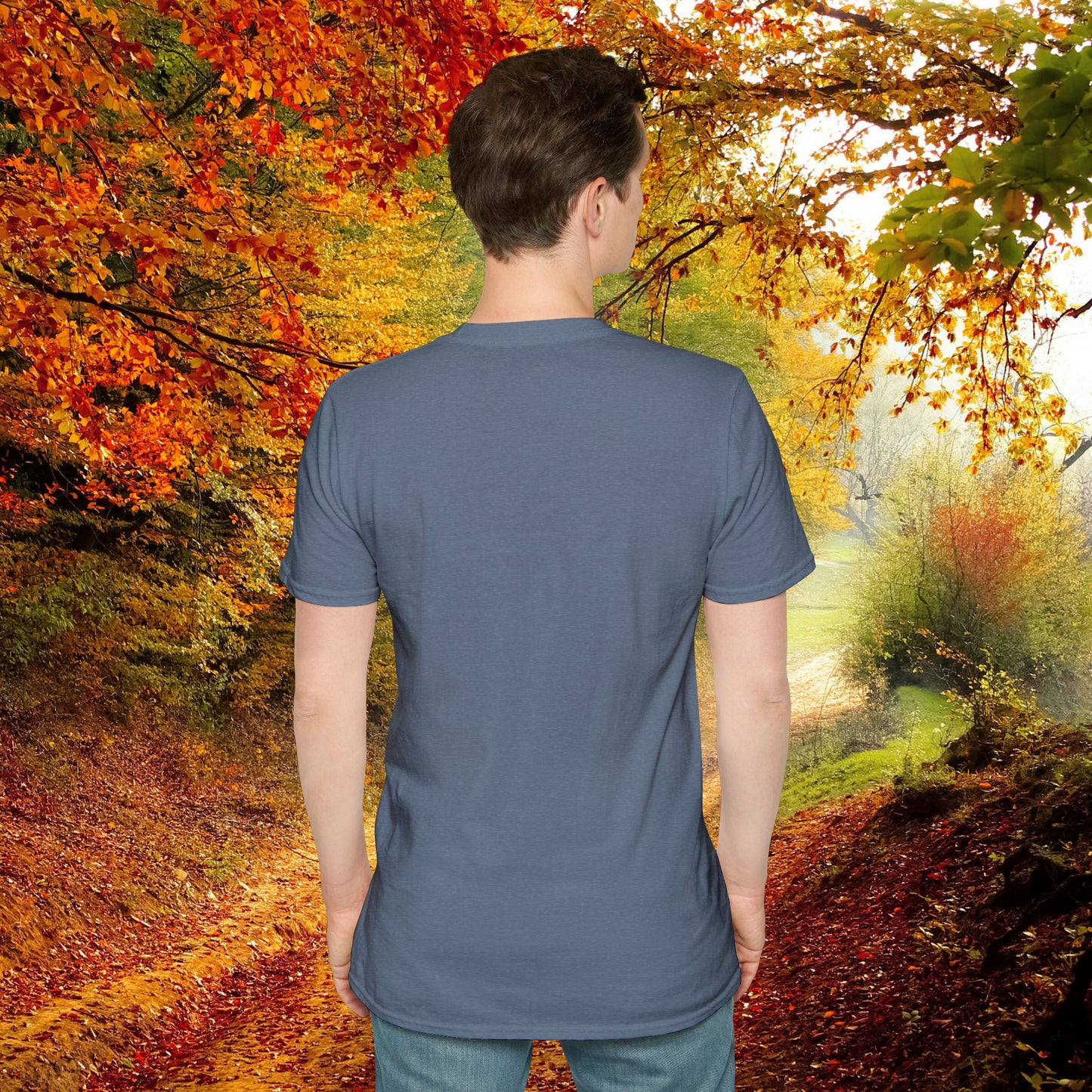 “LIVE HAPPILY EXPLORE MORE” message on this mountain sports inspired Unisex Softstyle T-Shirt.