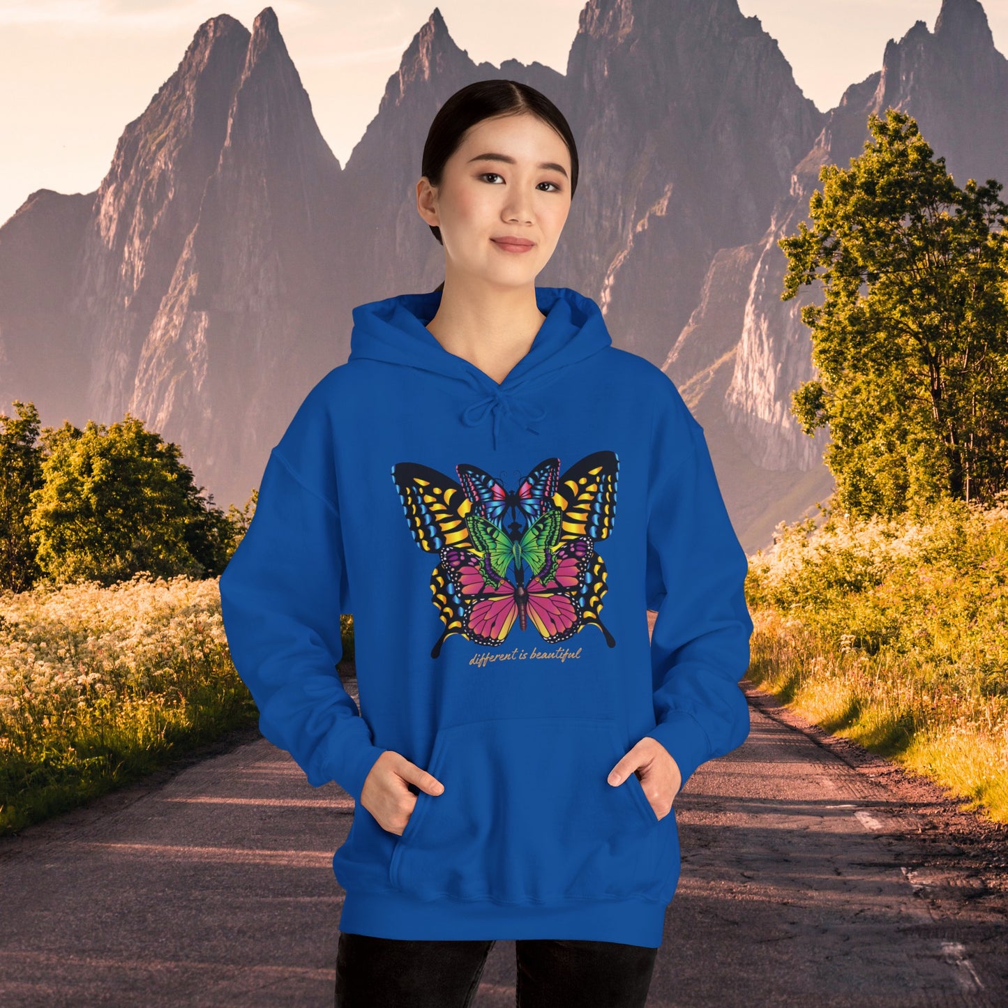 Diversity is celebrated on this butterflies filled “different is beautiful" Unisex Heavy Blend™ Hooded Sweatshirt