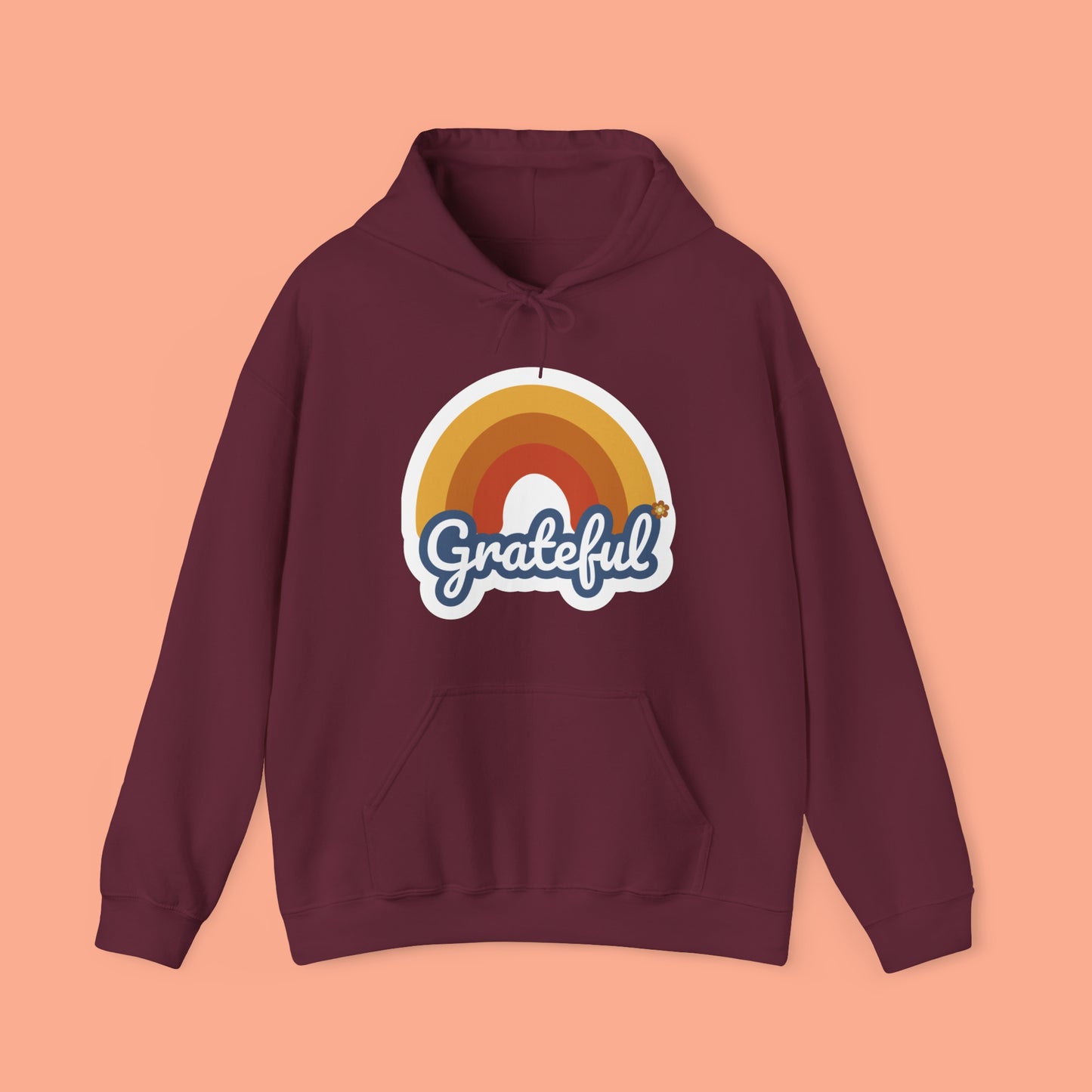 Simple rainbow over Grateful design on this Unisex Heavy Blend™ Hooded Sweatshirt