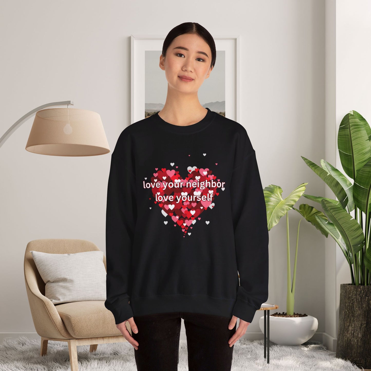 “love your neighbor love yourself” on top of a beautiful heart of hearts. Give the gift of this Unisex Heavy Blend™ Crewneck Sweatshirt or get one for yourself.