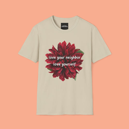 A message of “love your neighbor love yourself” over a beautiful red flower. This is a Unisex Softstyle T-Shirt.