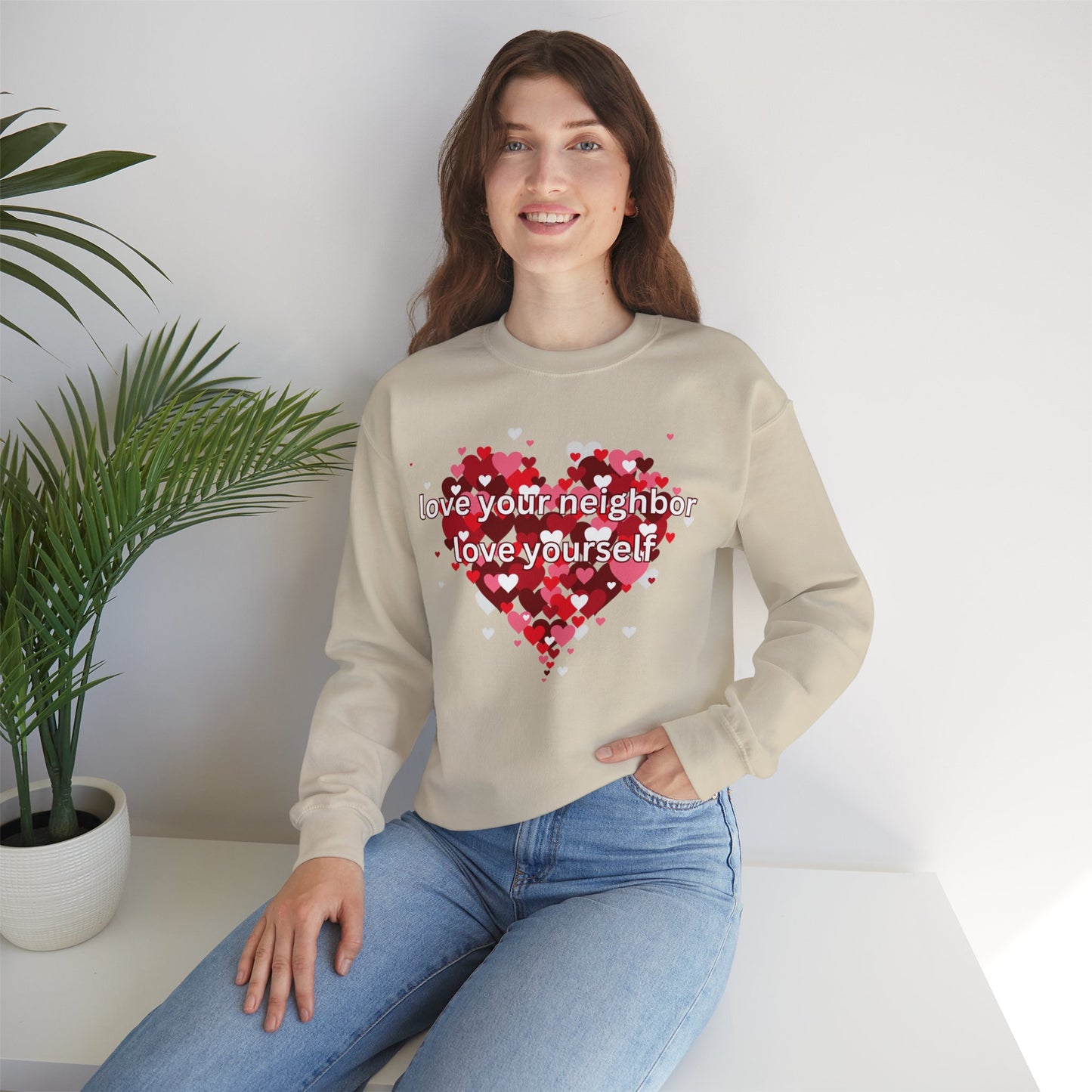 “love your neighbor love yourself” on top of a beautiful heart of hearts. Give the gift of this Unisex Heavy Blend™ Crewneck Sweatshirt or get one for yourself.