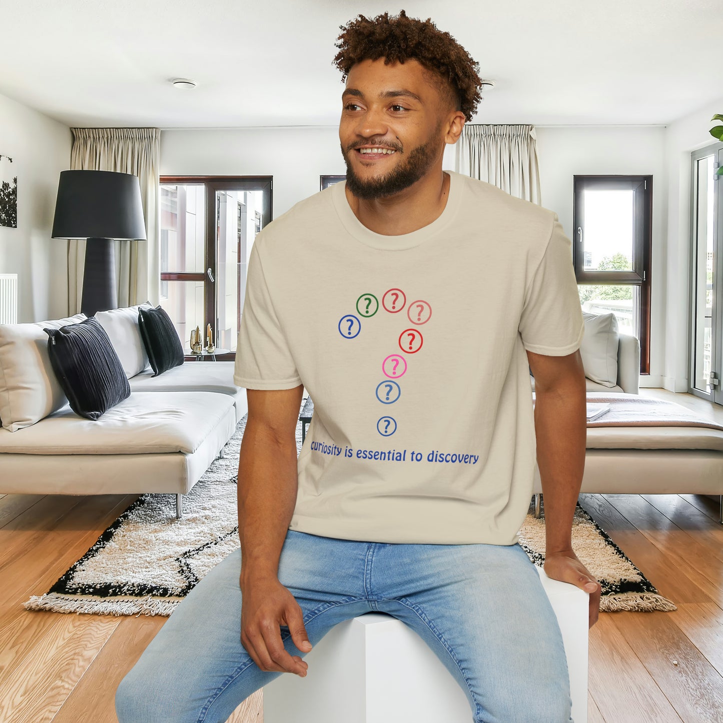 A question mark made of question marks above “curiosity is essential to discovery” message design on this Unisex Softstyle T-Shirt design.