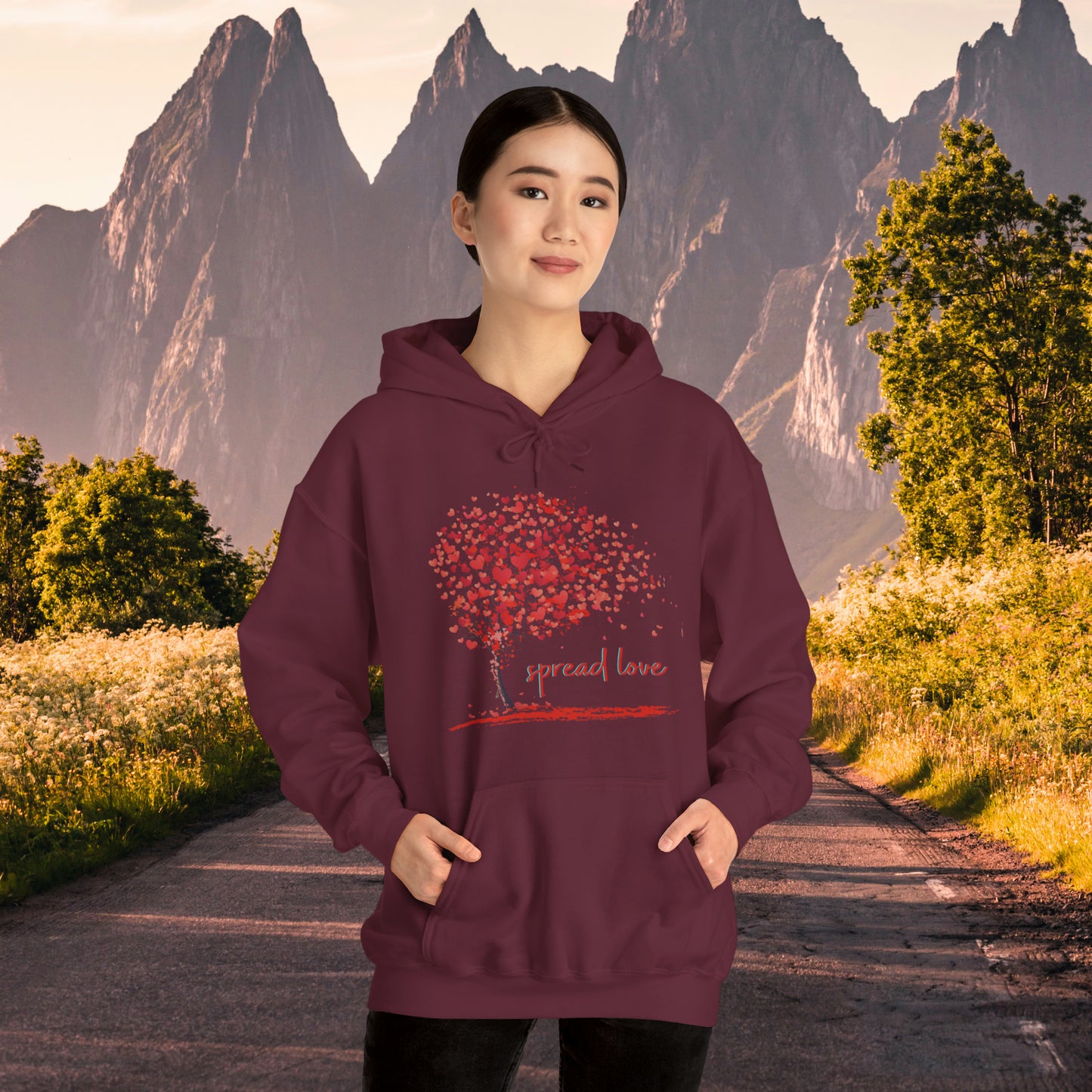 Spread love is the message on this heart filled tree designed Unisex Heavy Blend™ Hooded Sweatshirt